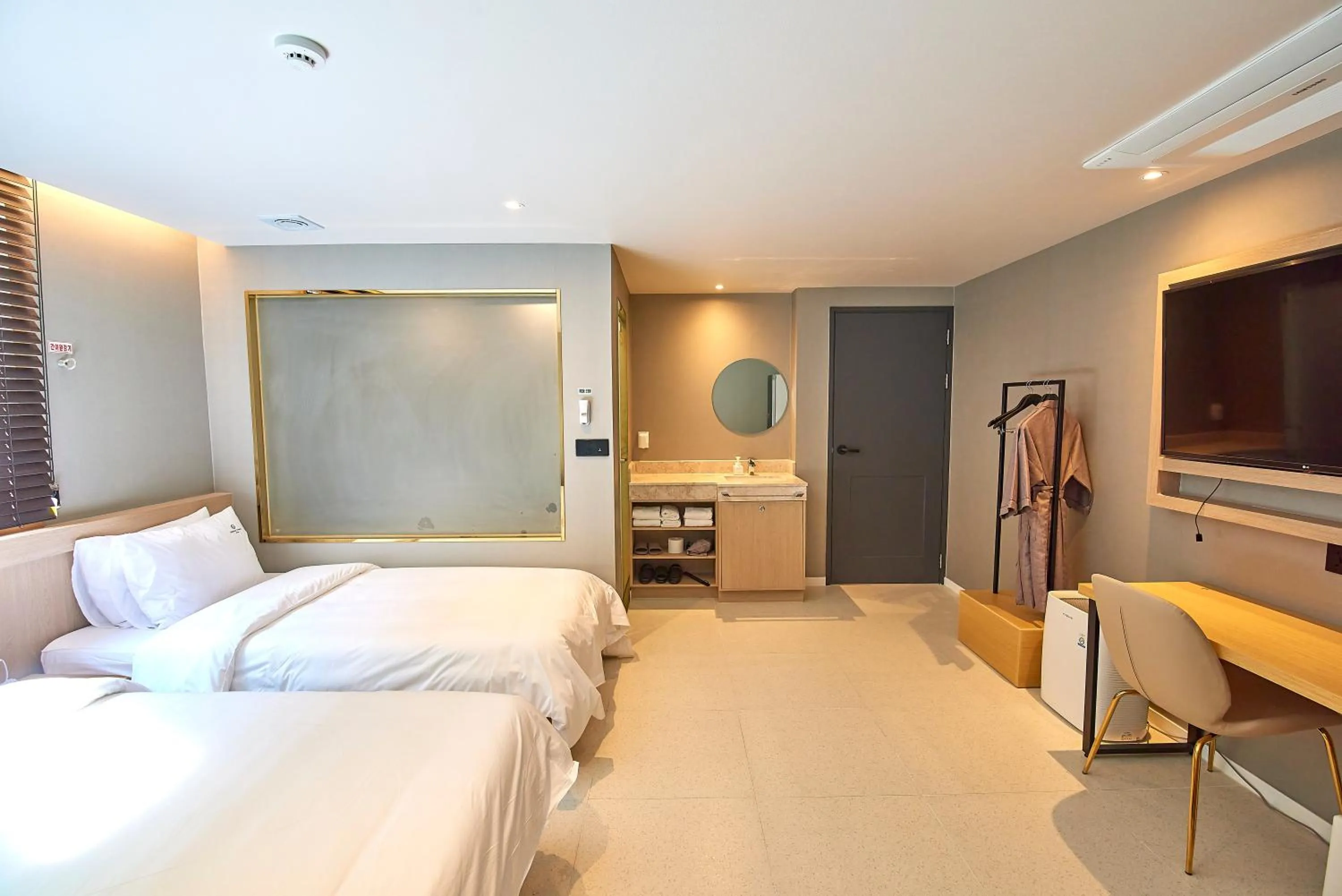 Bed in BONATHREE HOTEL