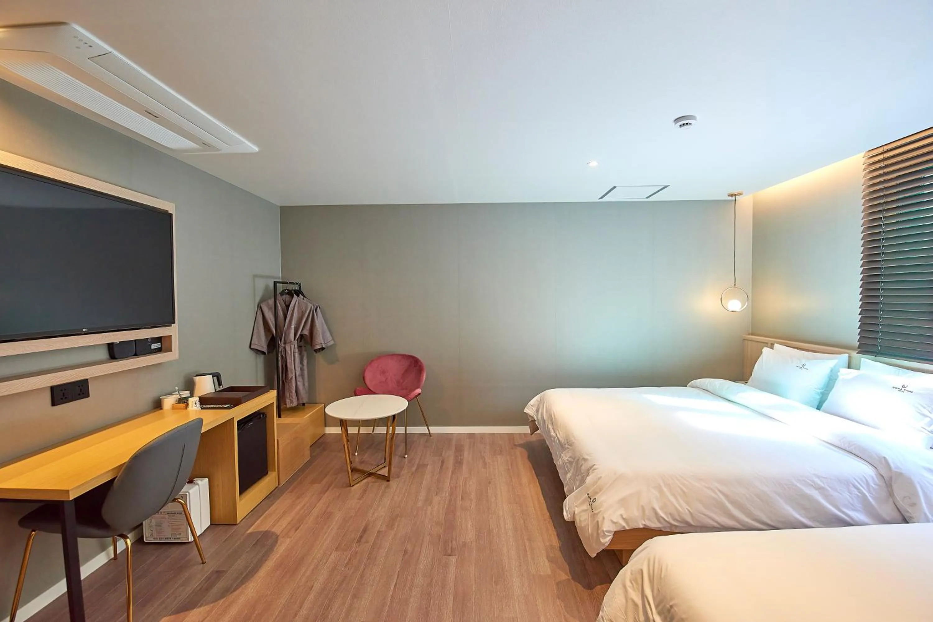 Bed in BONATHREE HOTEL