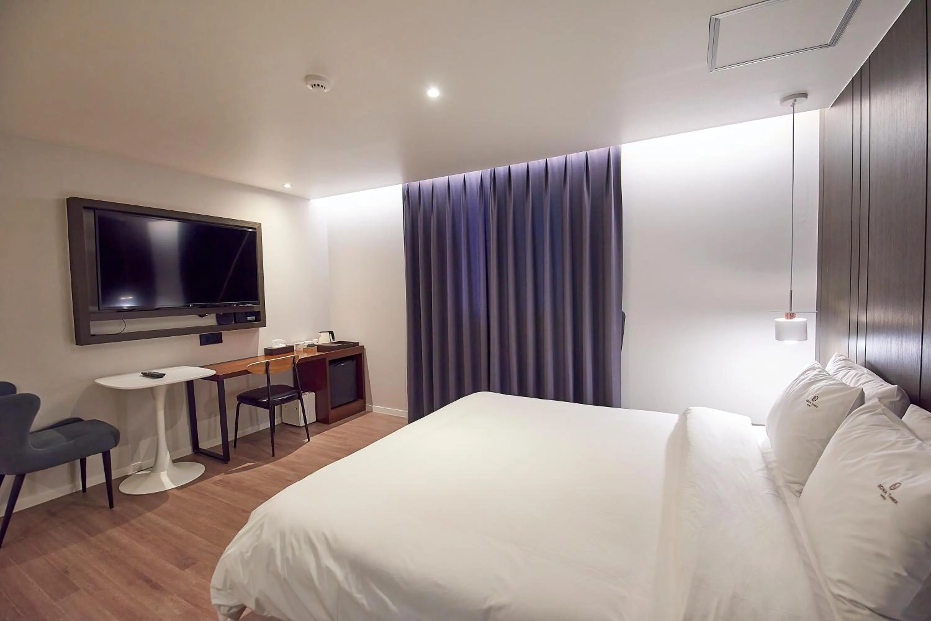 Bed in BONATHREE HOTEL