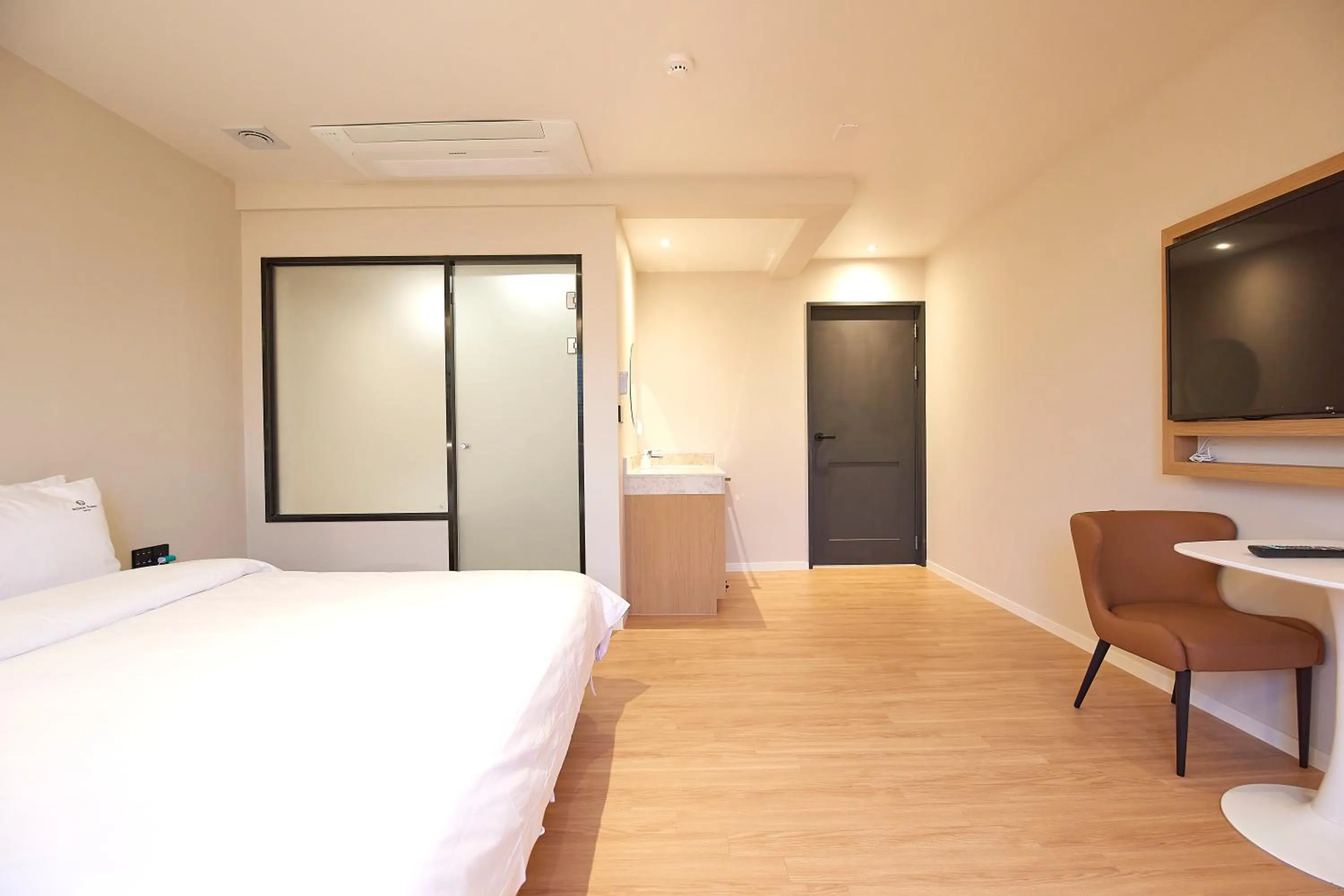 Bed in BONATHREE HOTEL