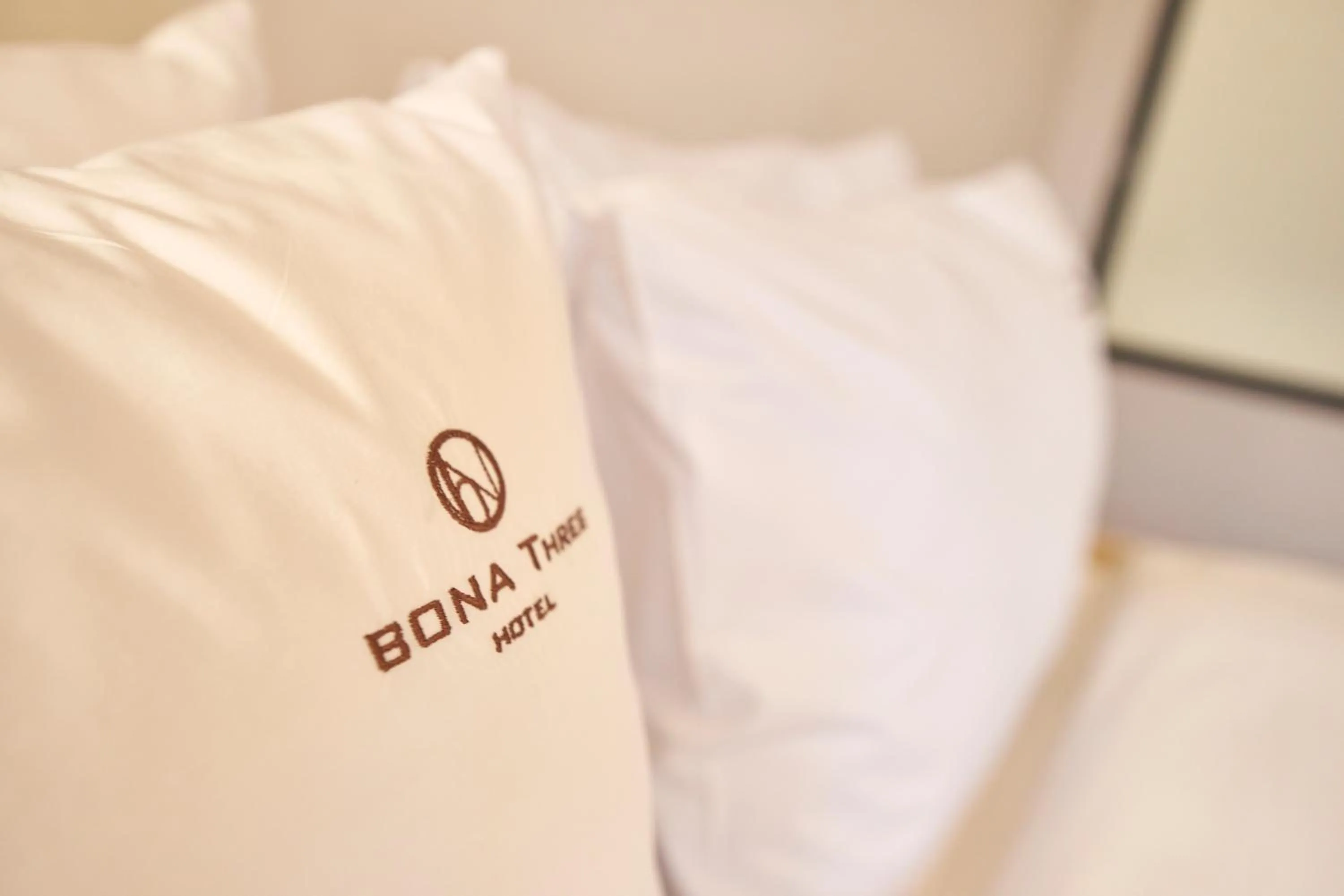 Bed in BONATHREE HOTEL
