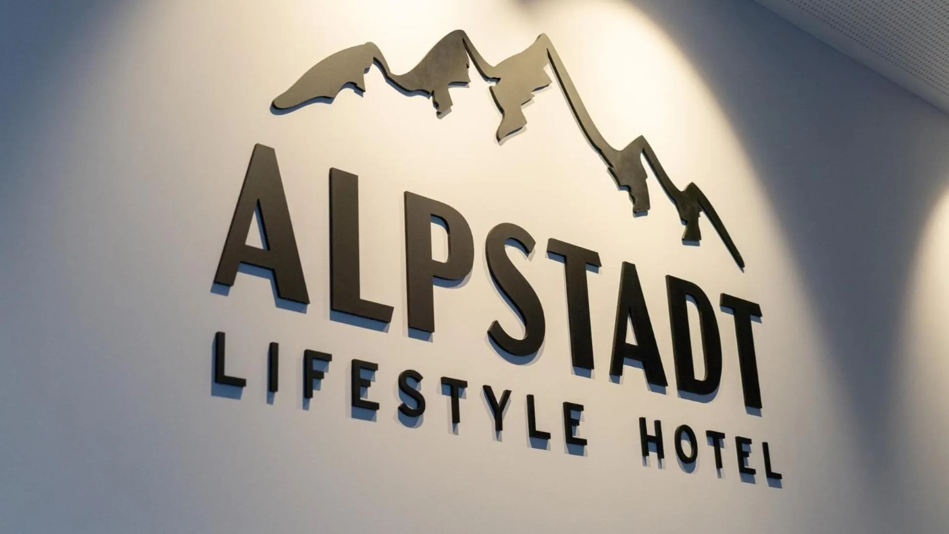 Property logo or sign in ALPSTADT LIFESTYLE Hotel