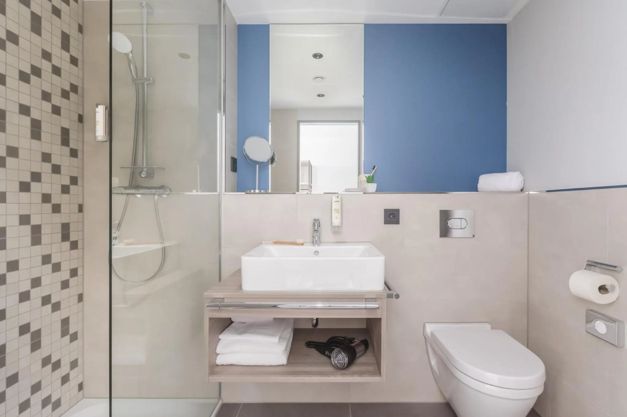 Bathroom in Candlewood Suites Augsburg by IHG