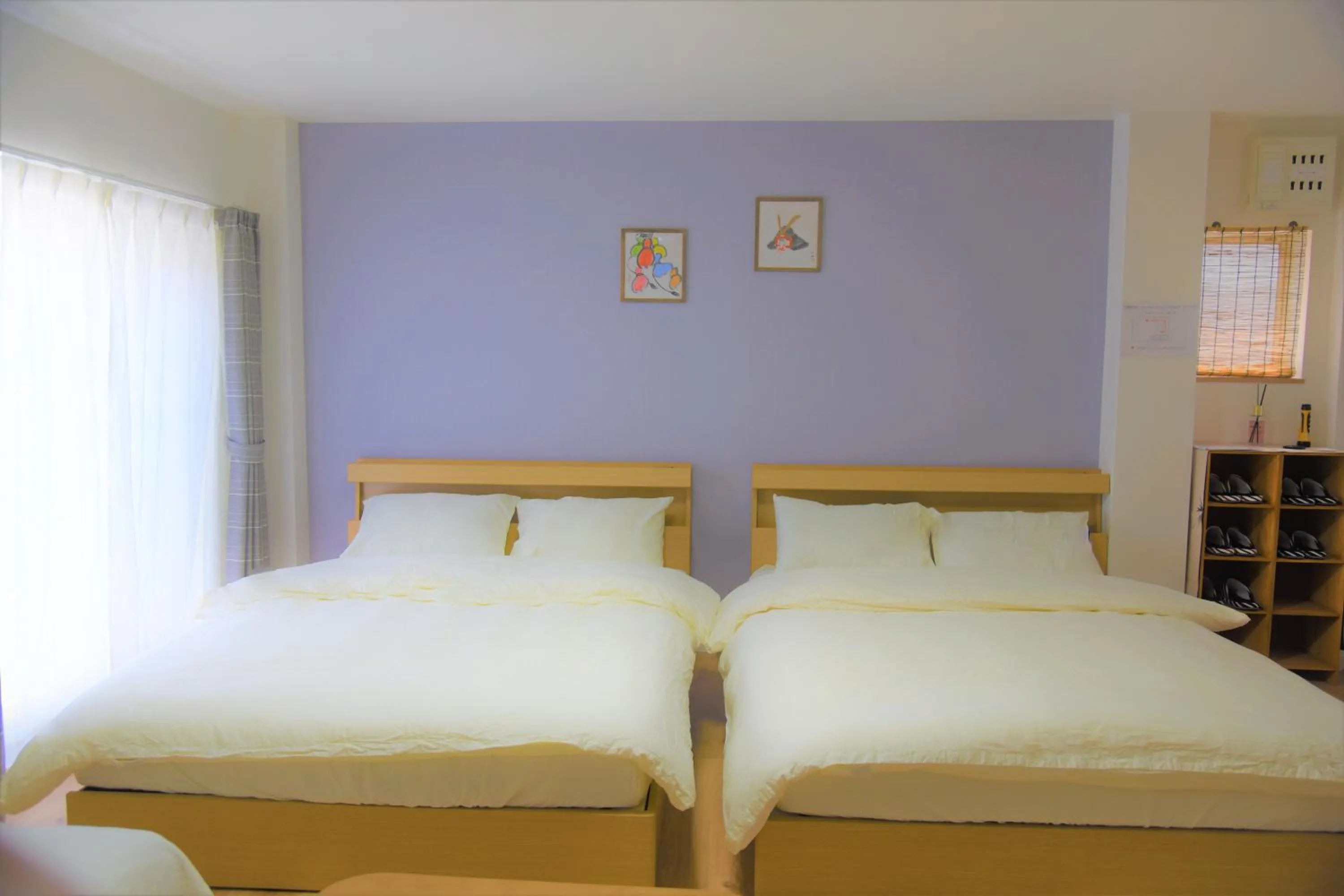 Bed in U-shuku Kyoto Fushimi