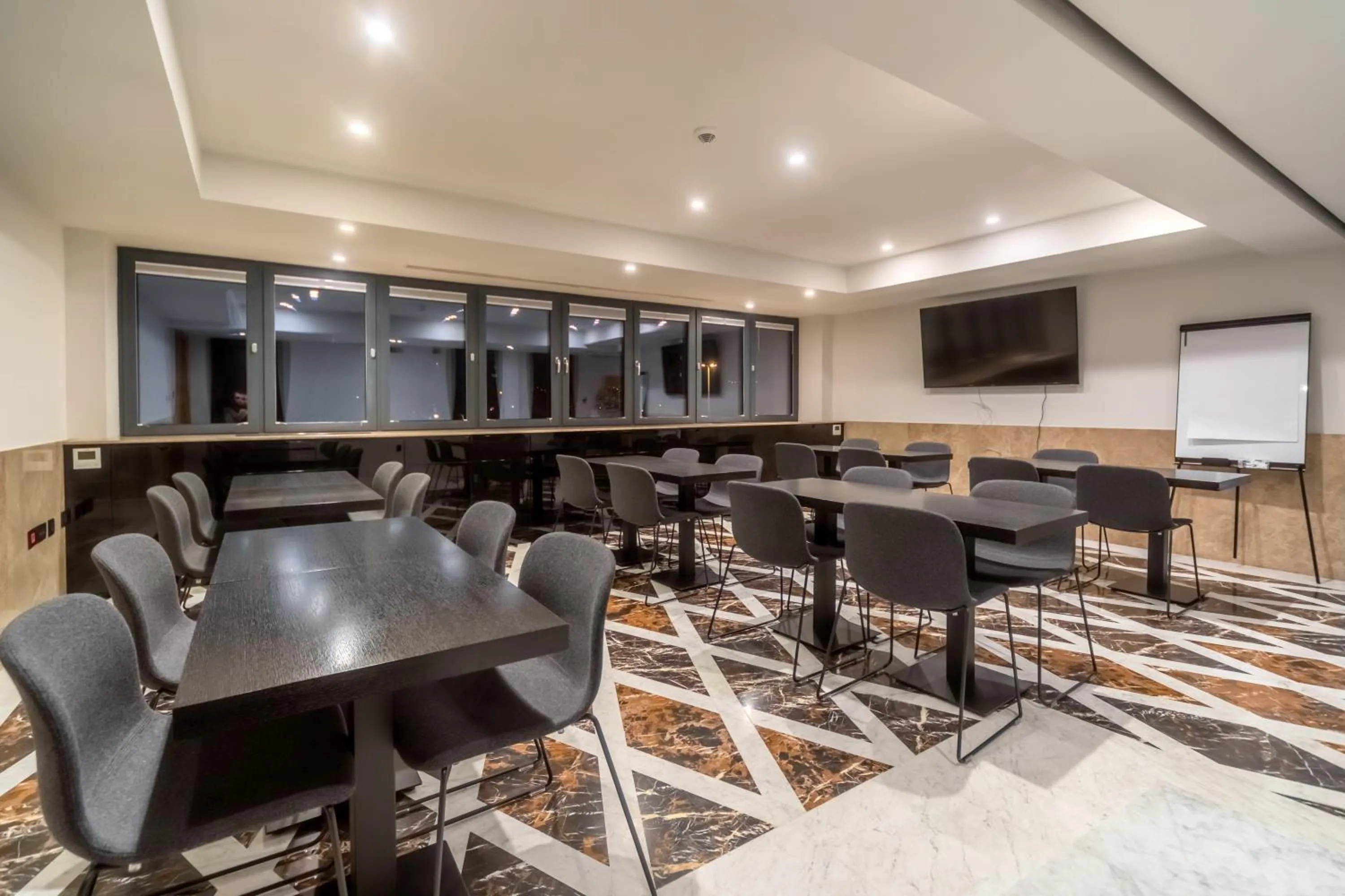 Communal lounge/ TV room in HOTEL AGAPE