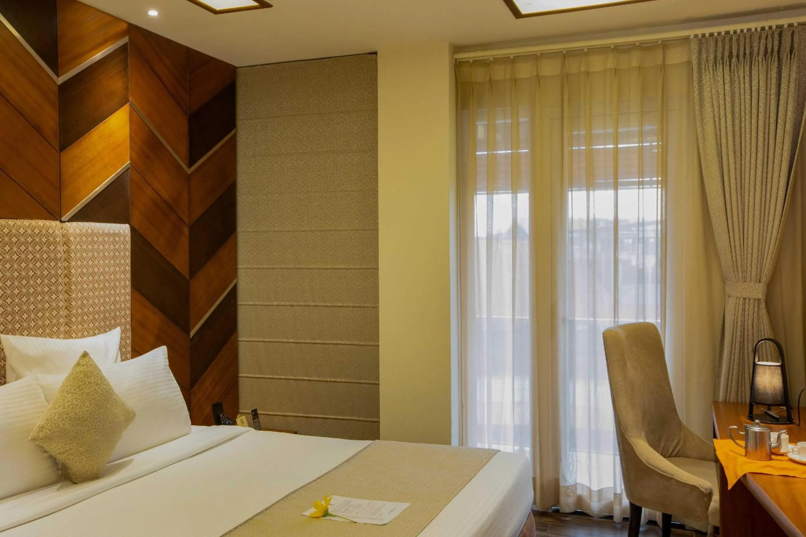 Bed in Coral Reef Hotel & Spa, Port Blair