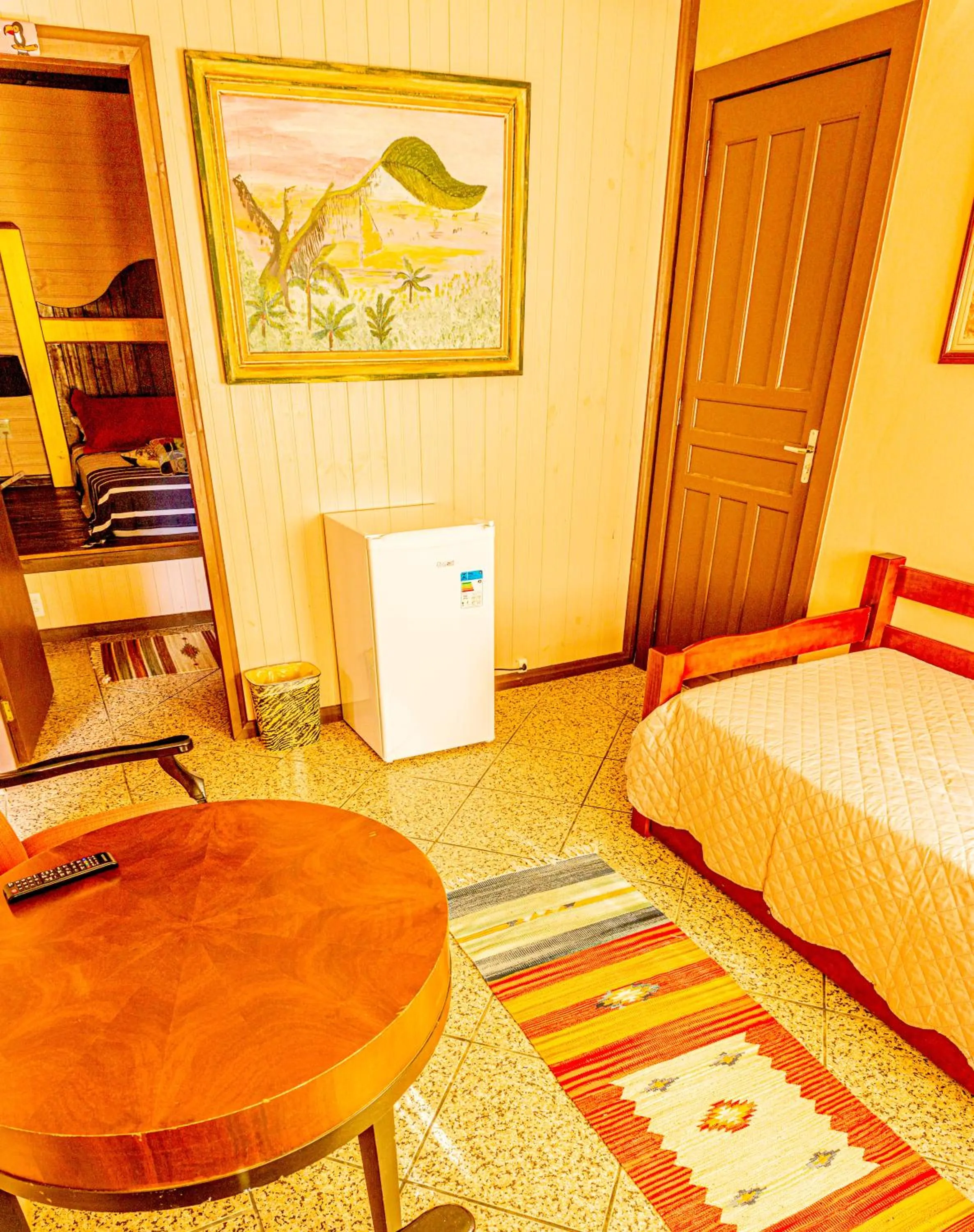 Communal lounge/ TV room, Bed in Pousada Casa do Oscar