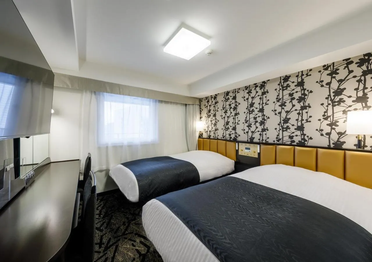 Photo of the whole room, Bed in APA Hotel Hakata Gion Ekimae