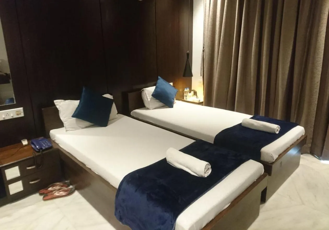 Bedroom, Bed in Tatvam Residency