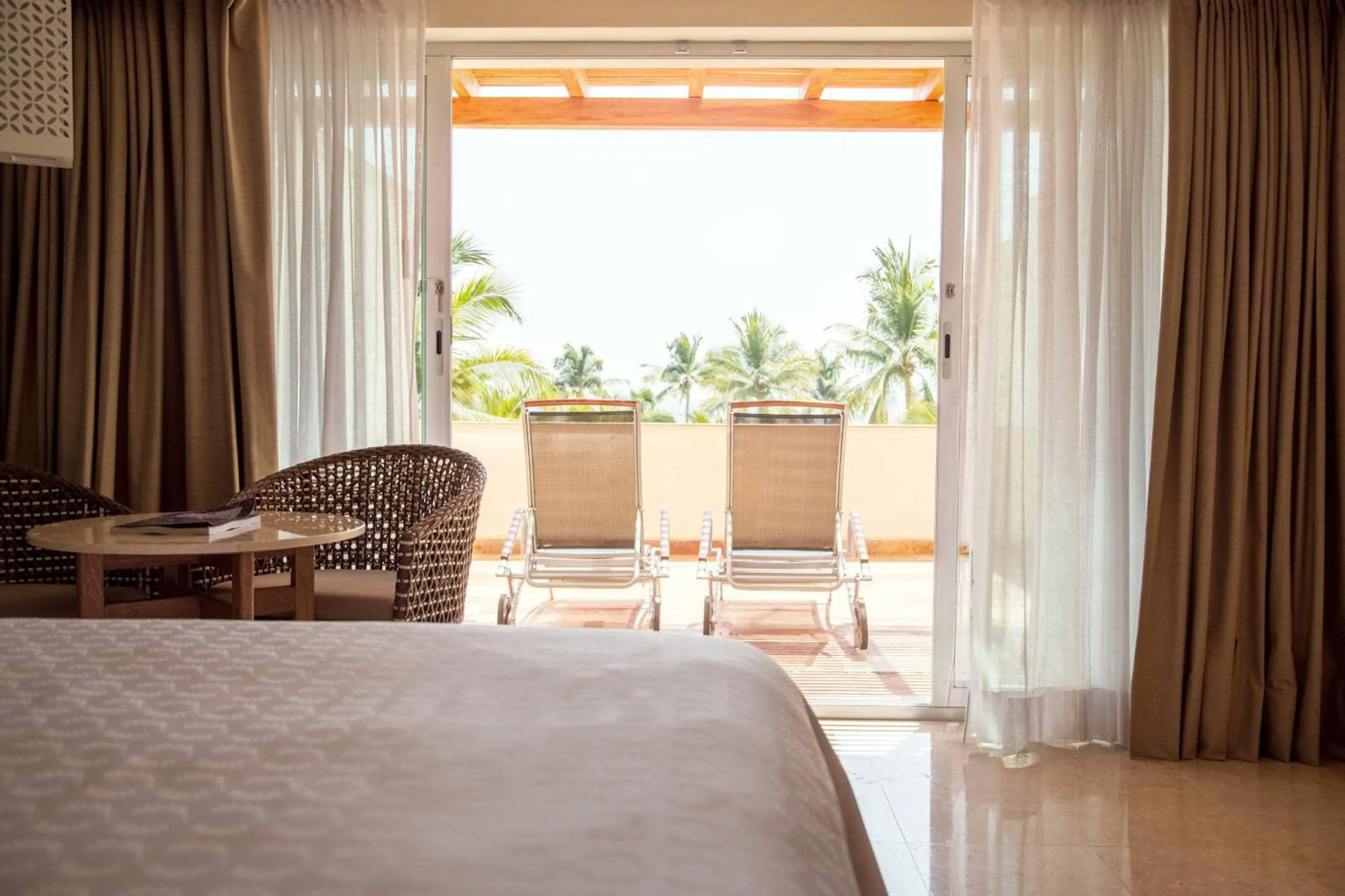 Photo of the whole room, Bed in Sheraton Buganvilias Resort & Convention Center