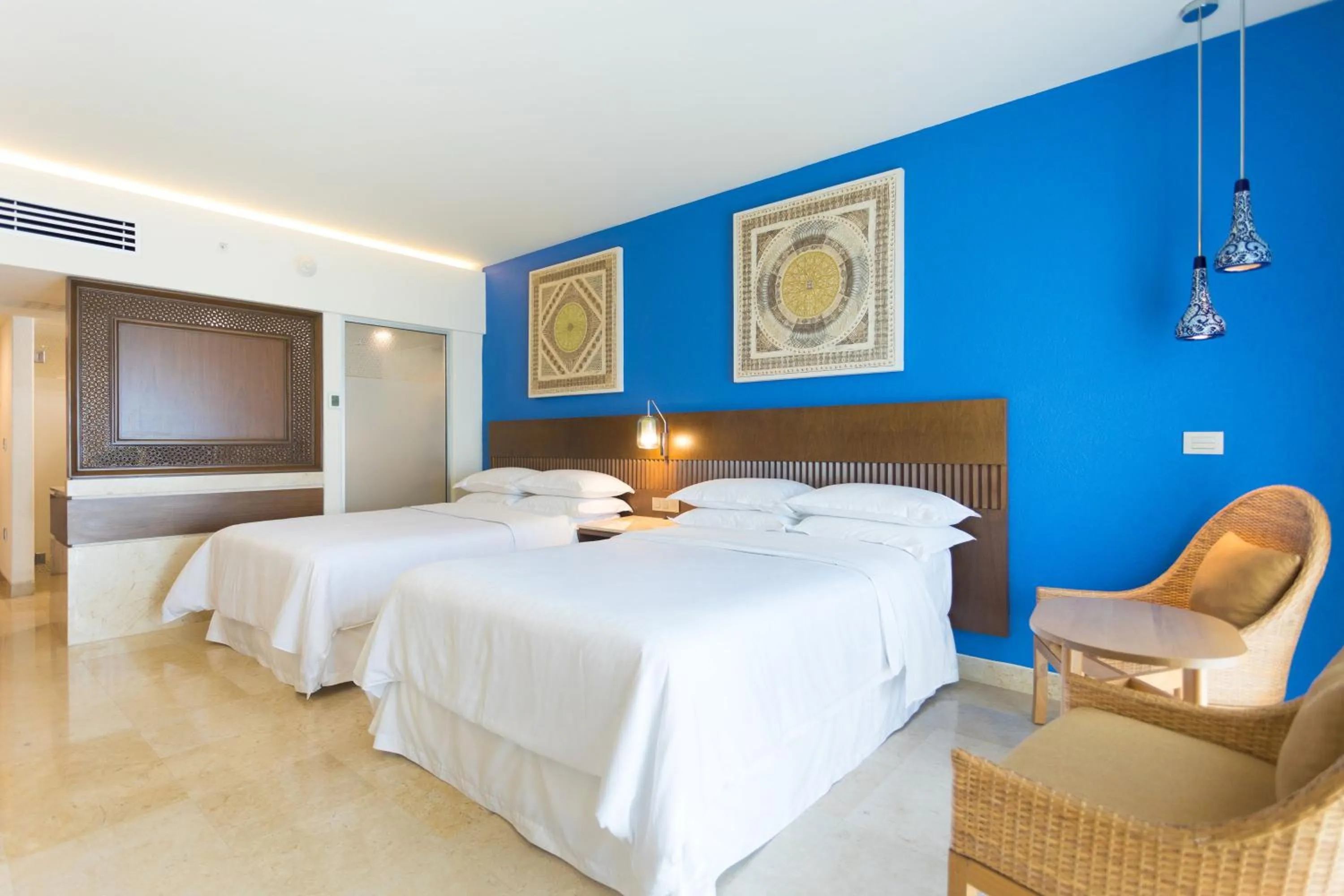 Photo of the whole room, Bed in Sheraton Buganvilias Resort & Convention Center