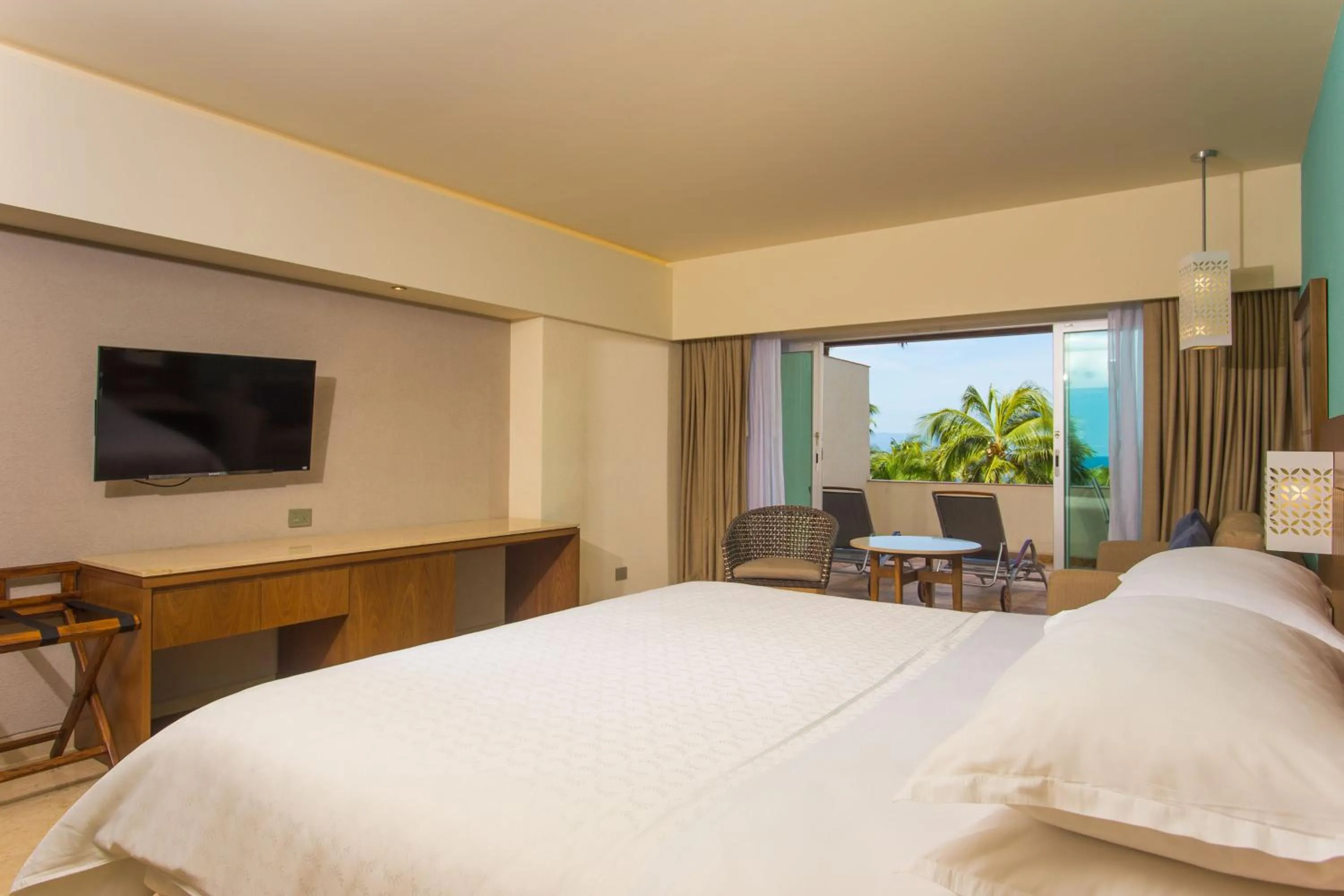 Photo of the whole room, Bed in Sheraton Buganvilias Resort & Convention Center