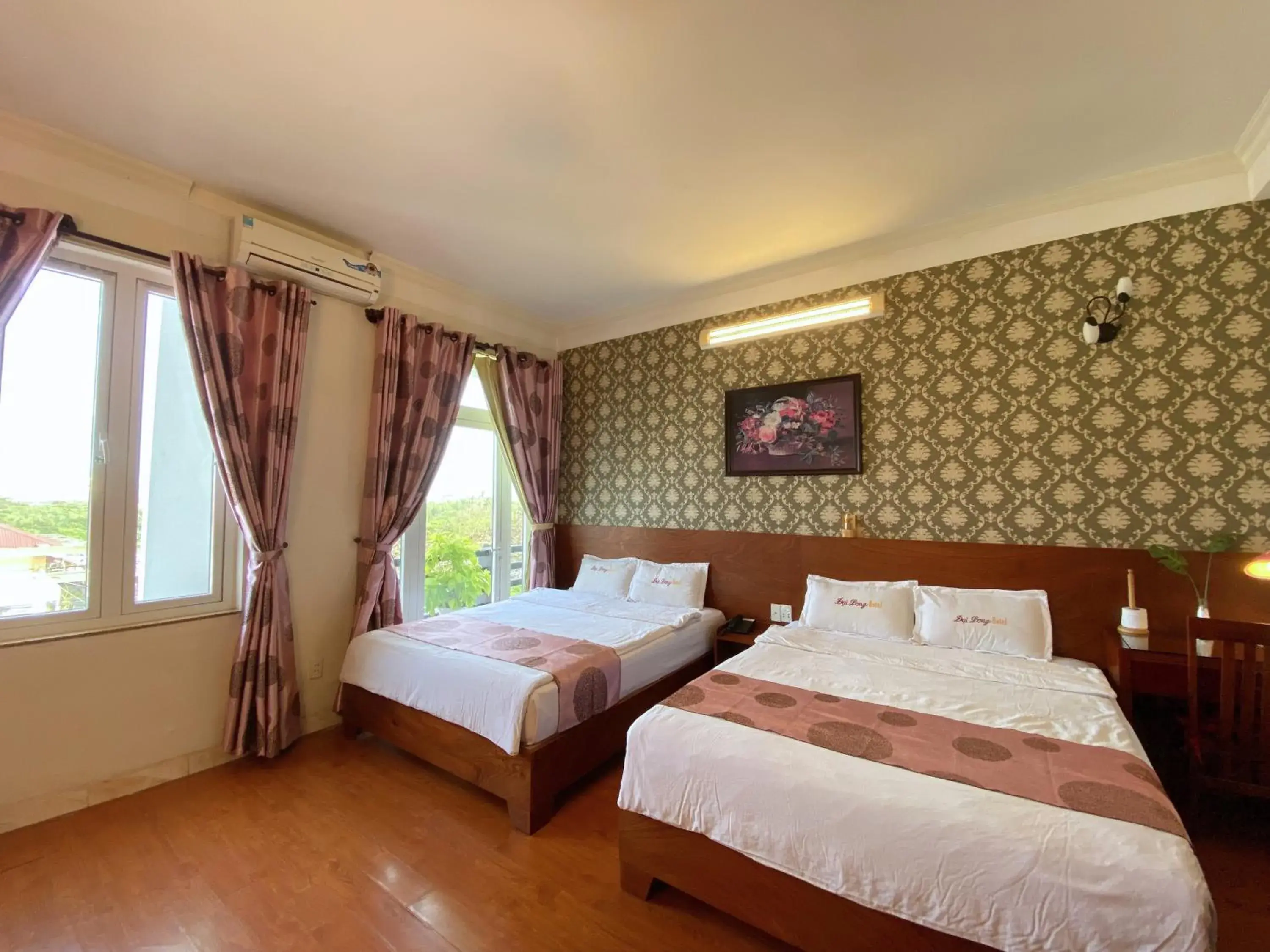 Quadruple Room with Balcony in Dai Long Hotel Quadruple Room with Balcony in Dai Long Hotel