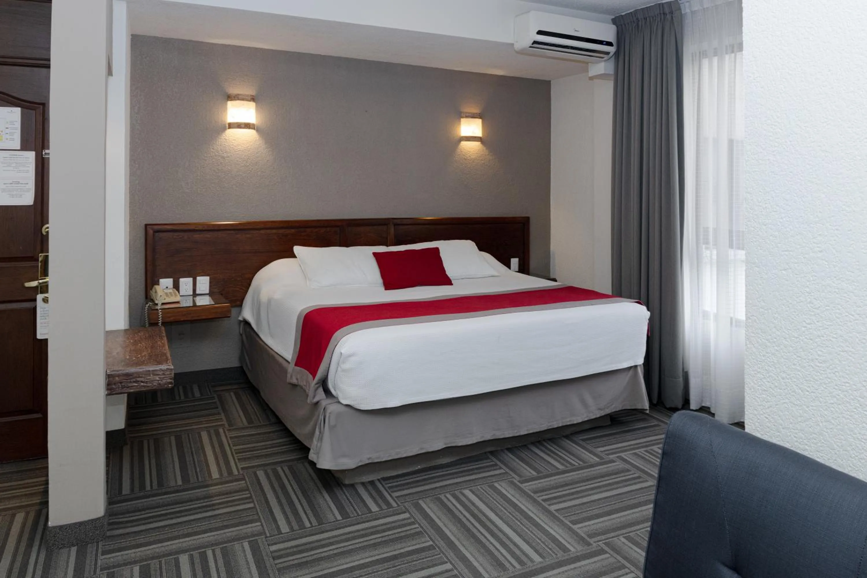 Bed in Ramada Plaza by Wyndham Leon