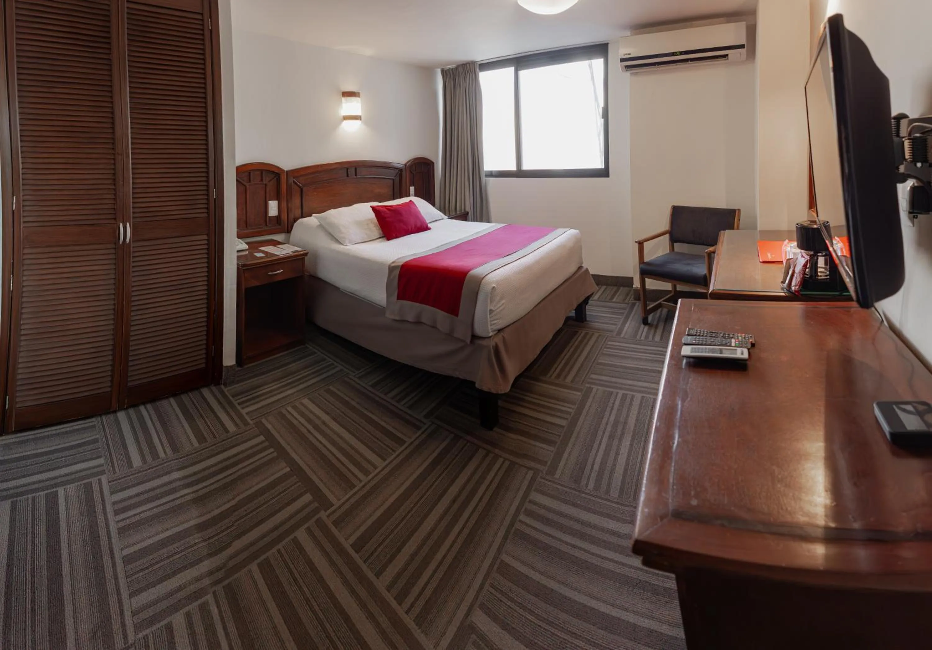 Bed in Ramada Plaza by Wyndham Leon