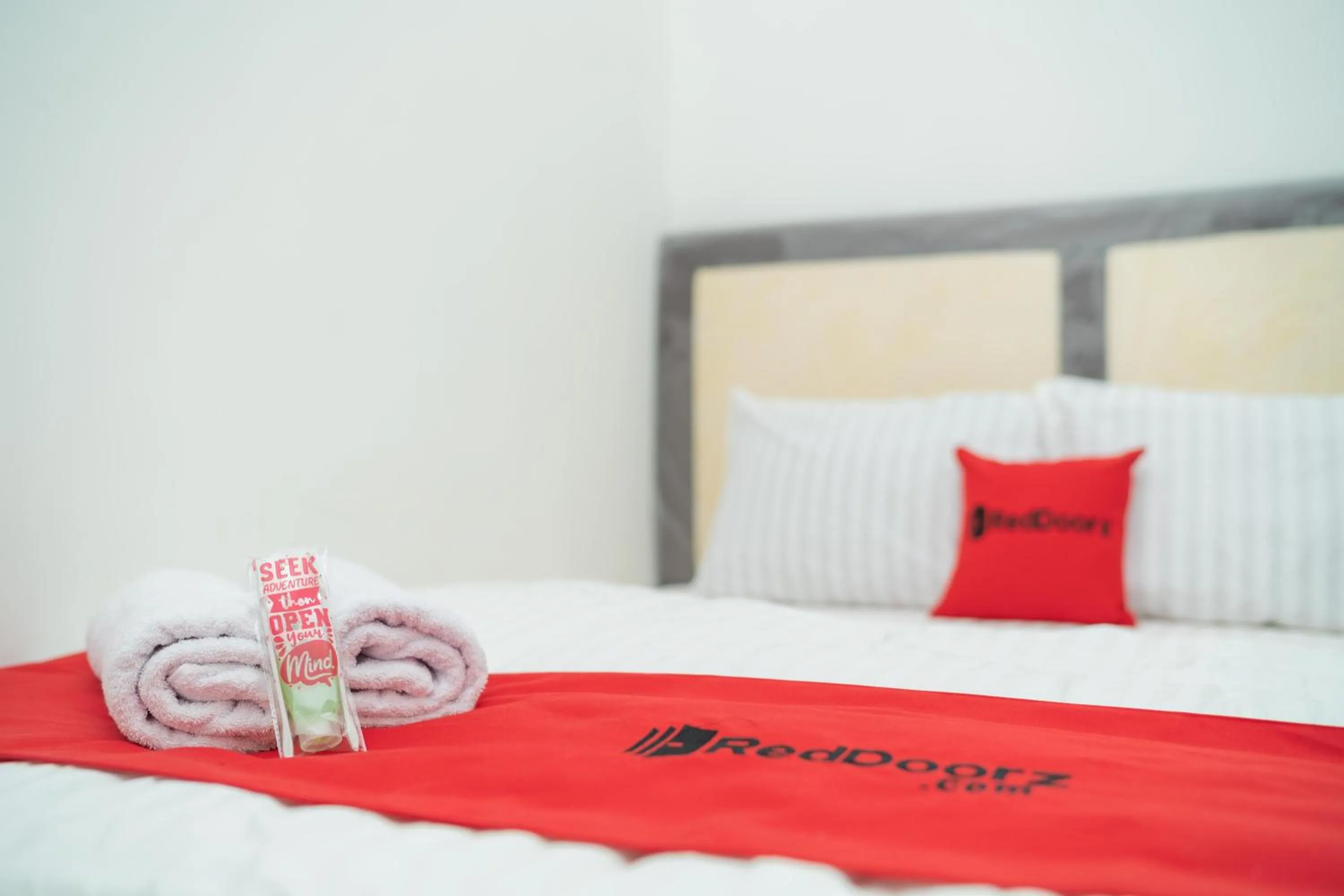 Bed in RedDoorz near Bundaran Ciceri