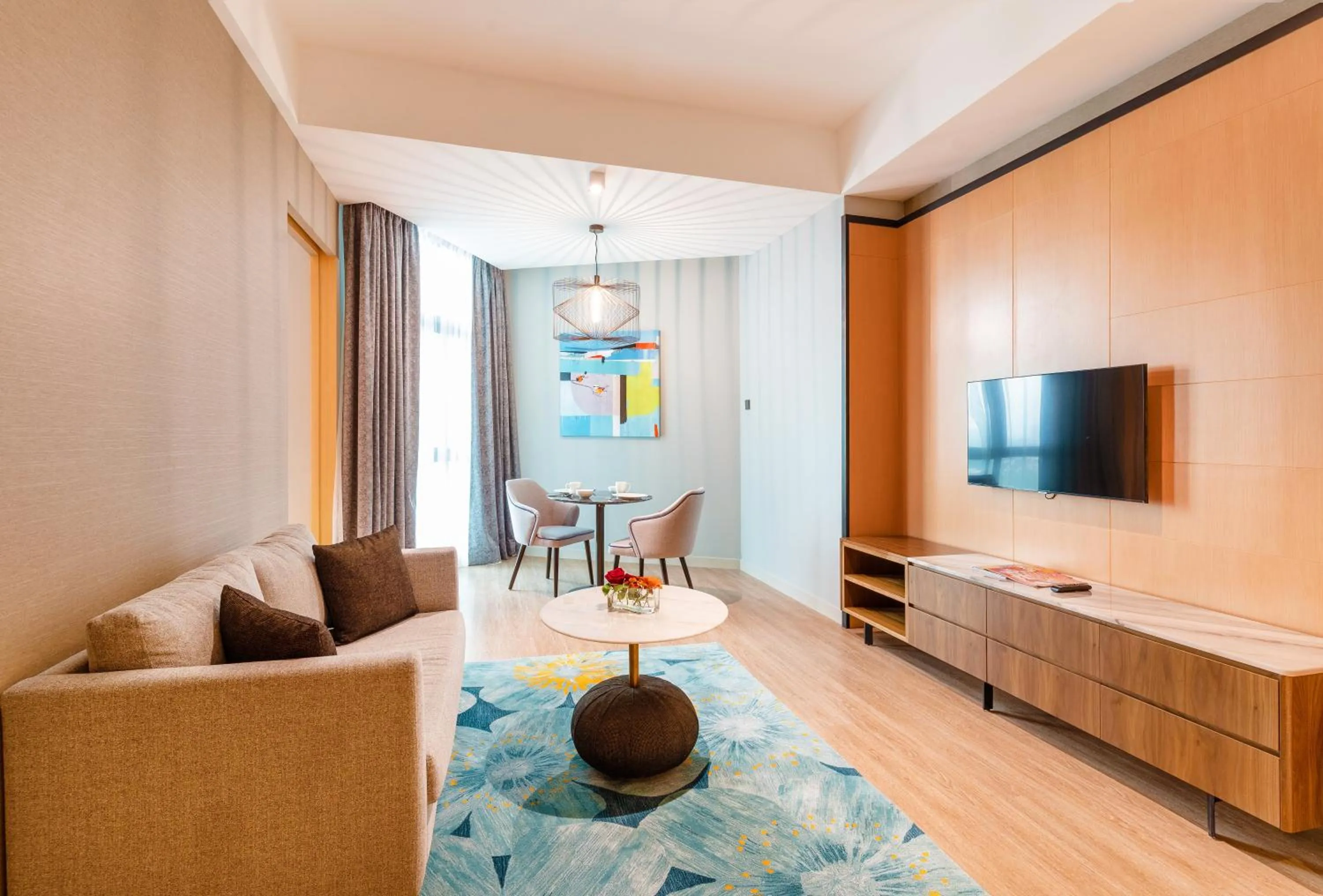 Seating area, Bed in M World Hotel