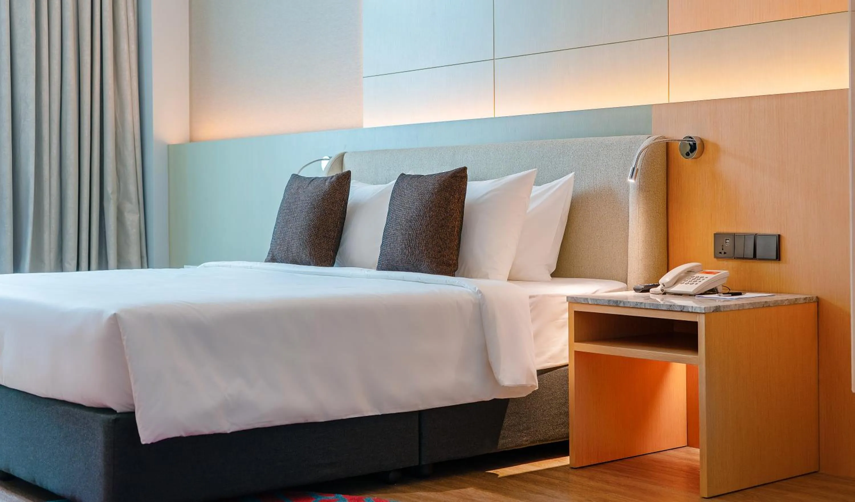 Bed in M World Hotel