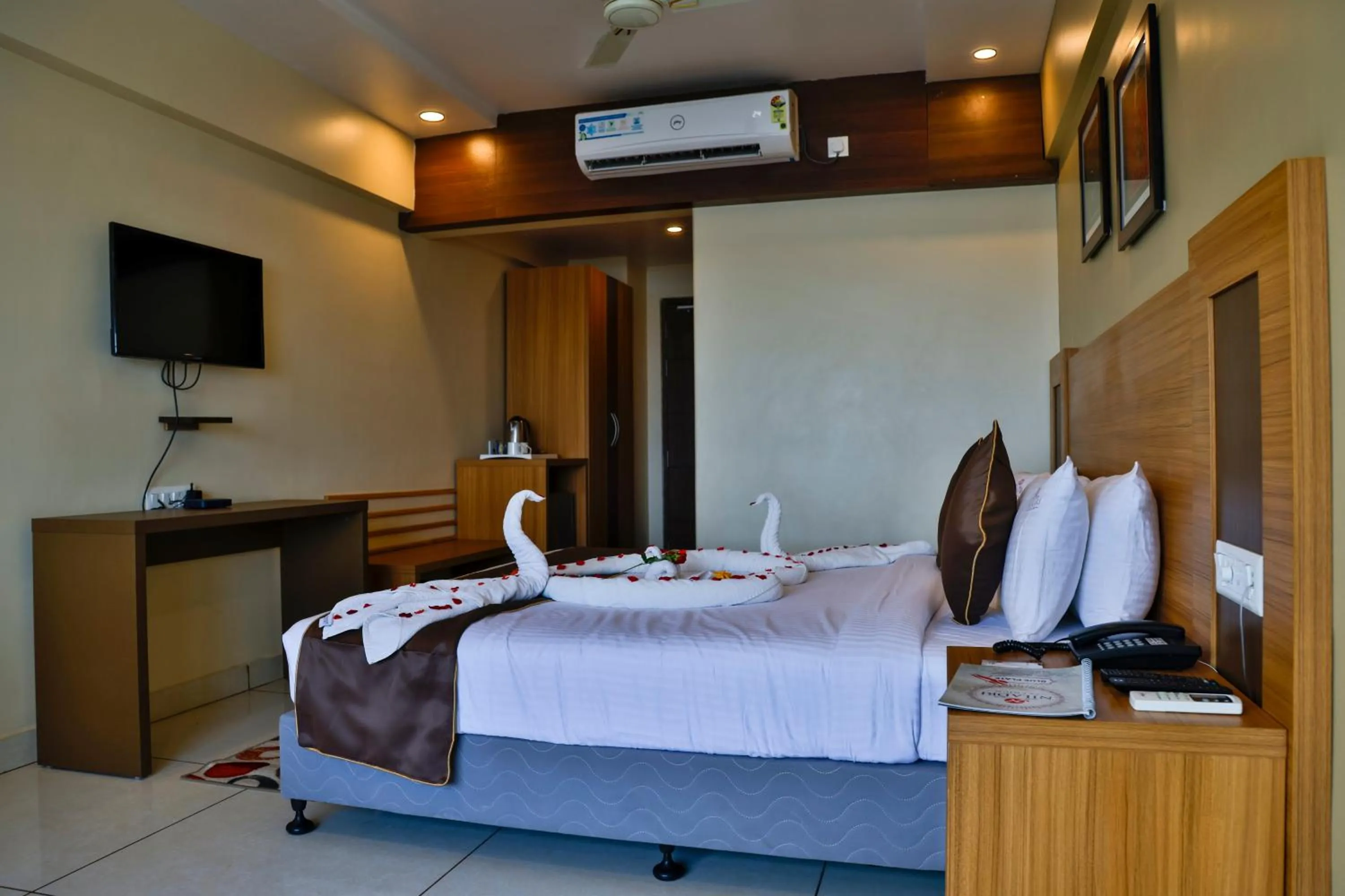 Bed in HOTEL NILADRI PREMIUM