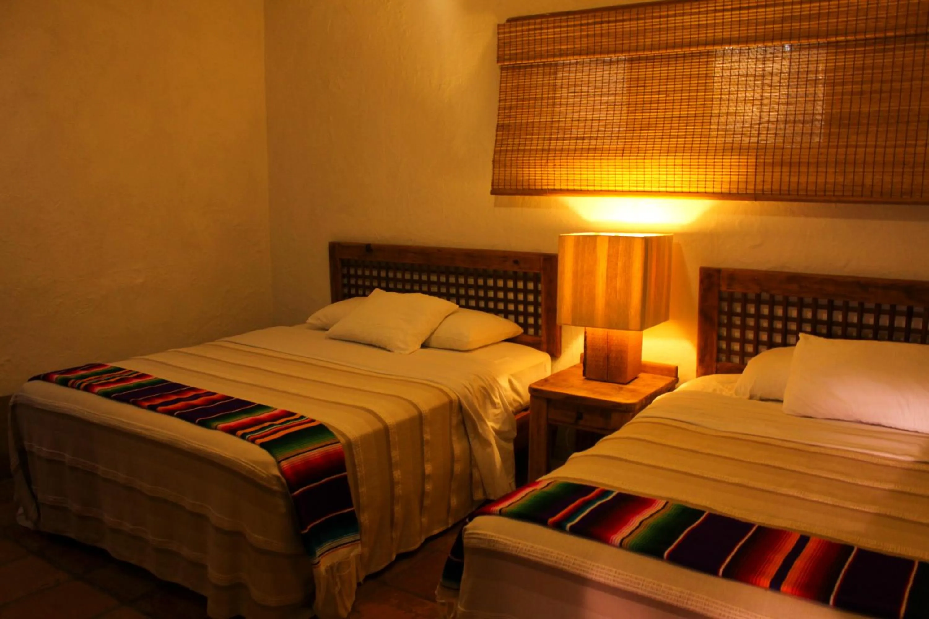 Bed in Villas El Rancho Green Resort