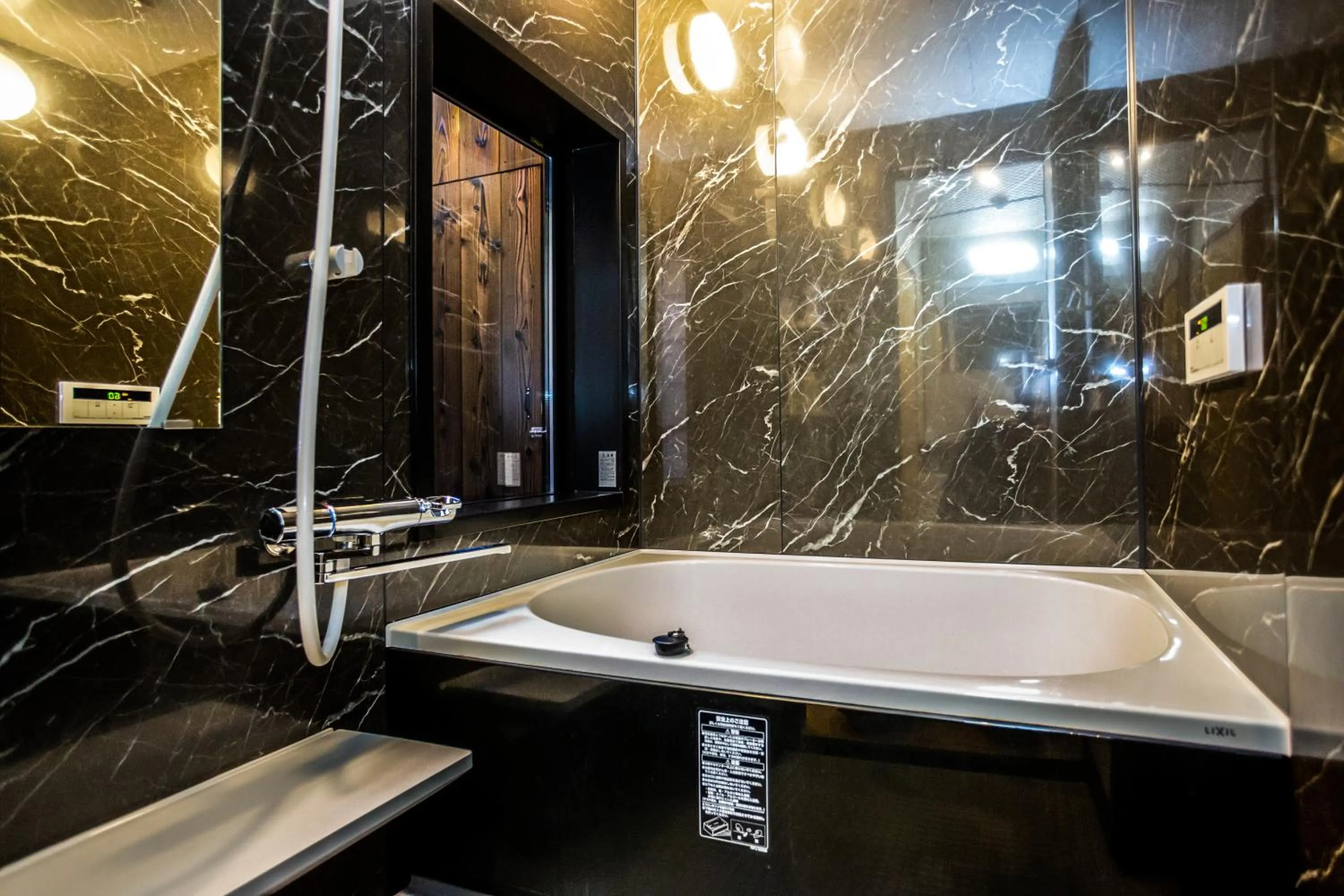 Bathroom in INN Plus Toji Fushin