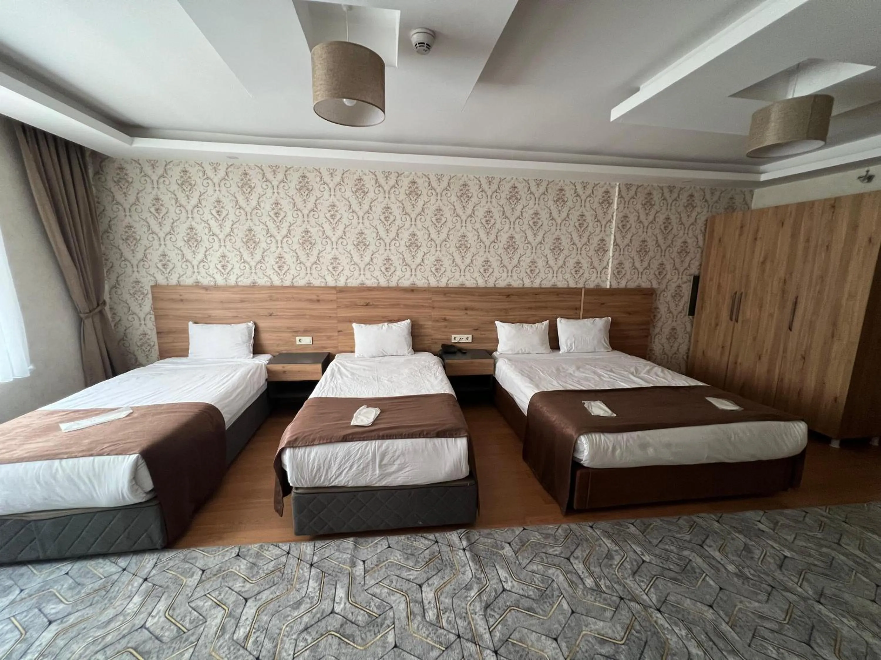 Bed in inDİANA HOTEL