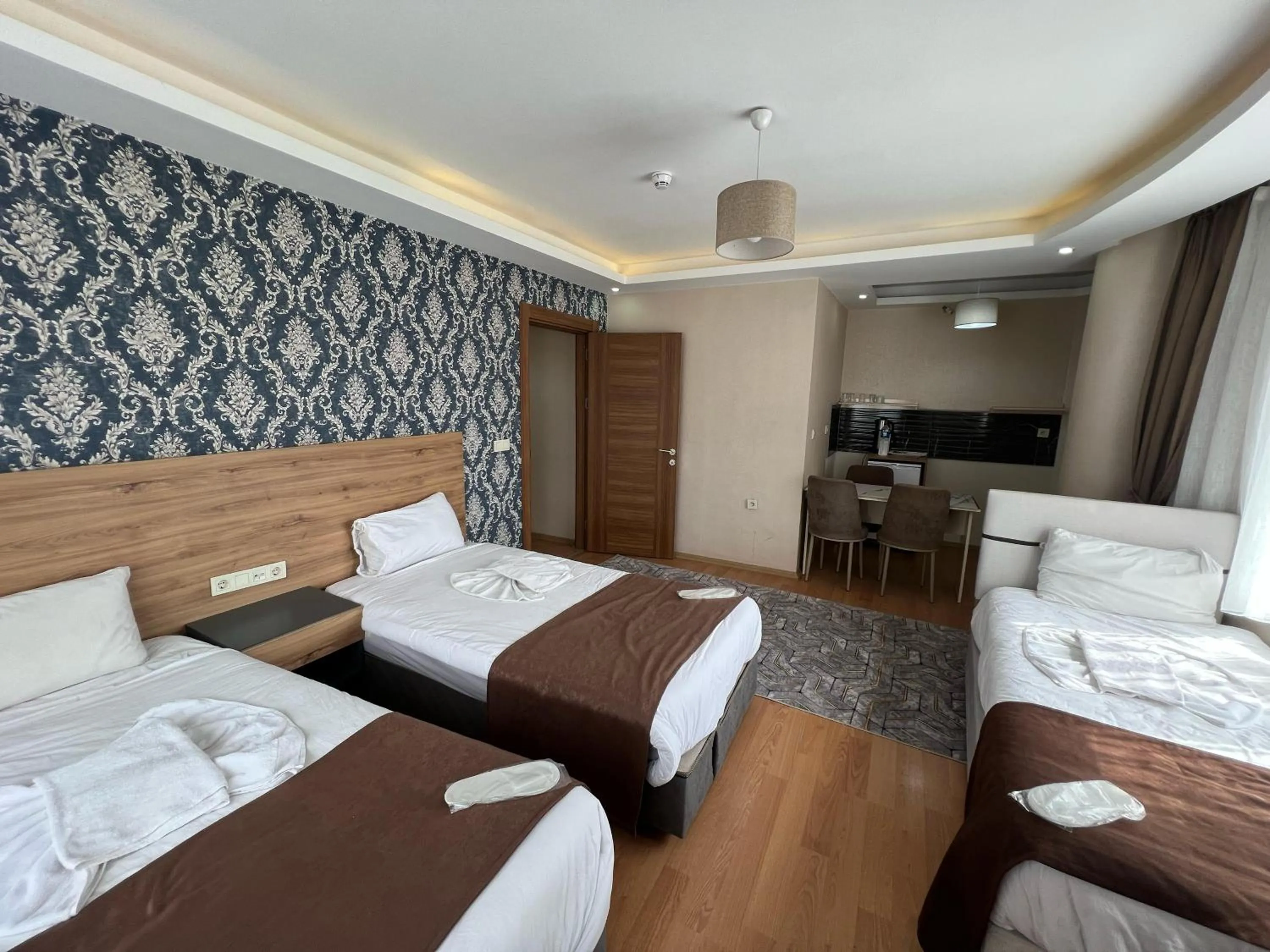 Bed in inDİANA HOTEL