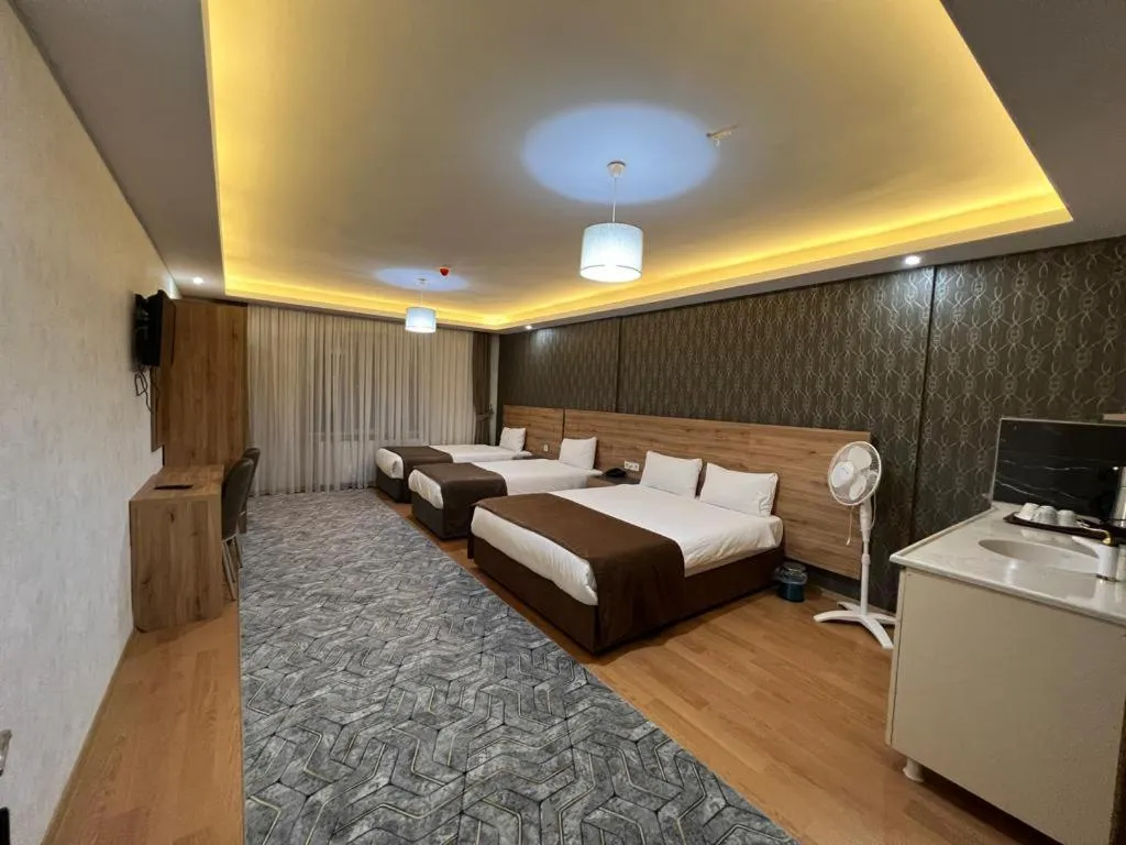 Bed in inDİANA HOTEL