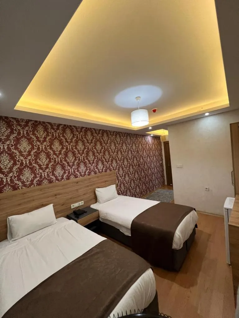 Bed in inDİANA HOTEL