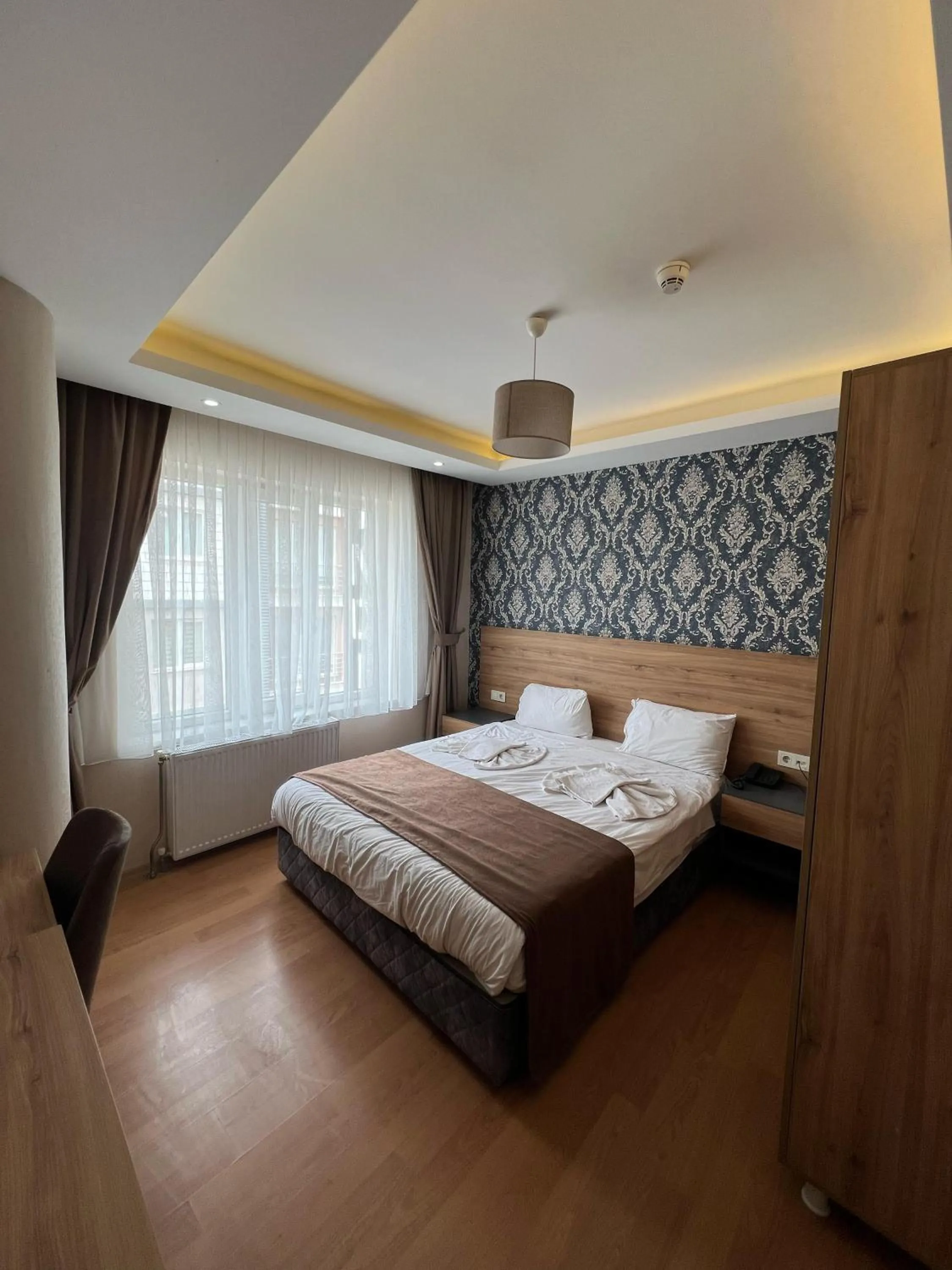 Bed in inDİANA HOTEL