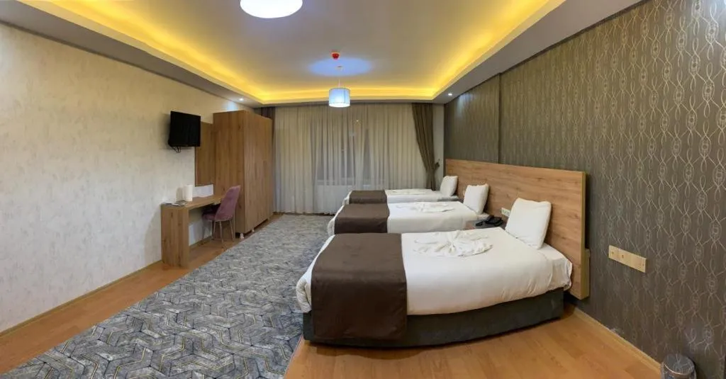 Bed in inDİANA HOTEL