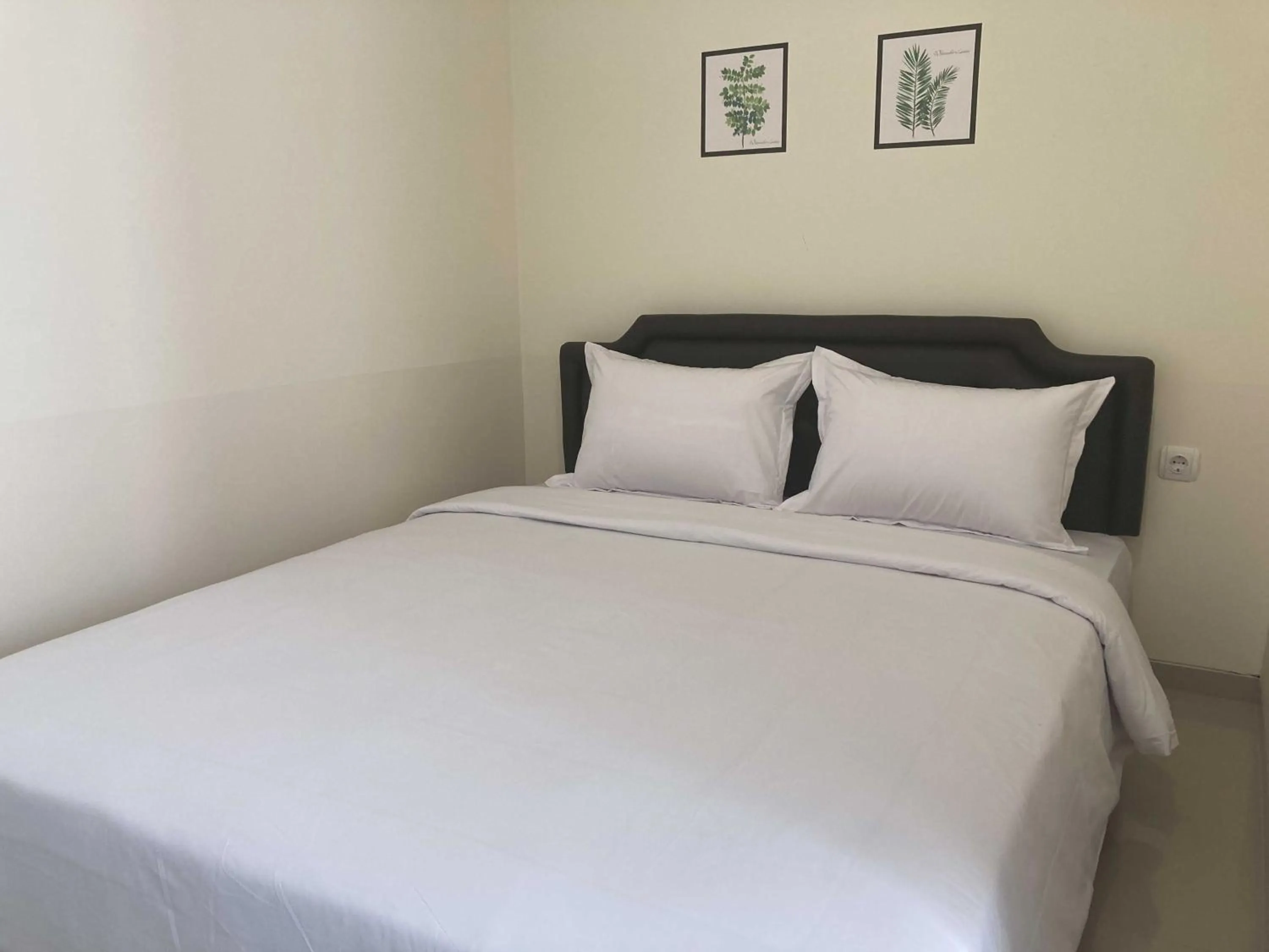 Bed in Hartono Inn Seturan Mitra RedDoorz