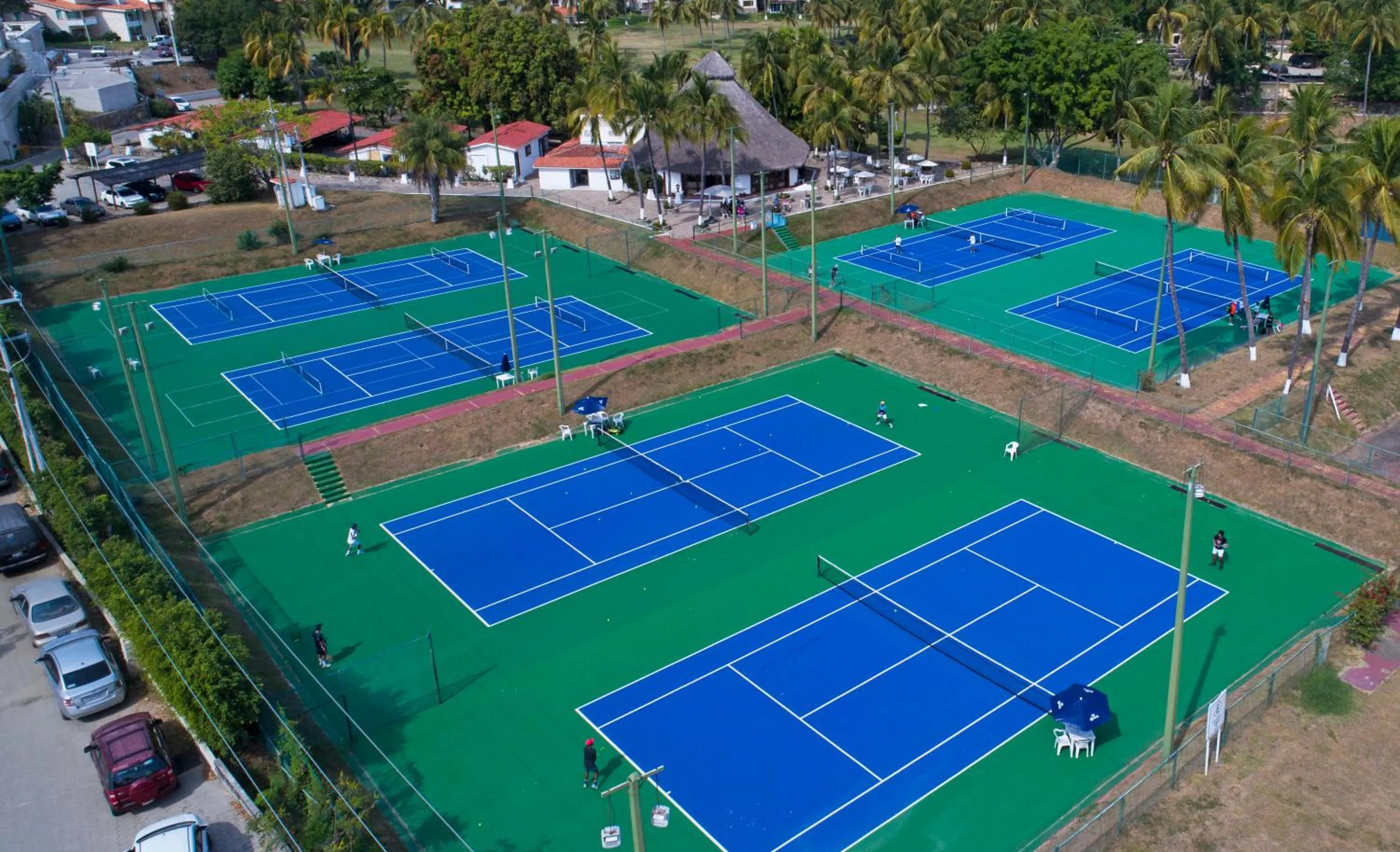 Tennis court in Las Hadas by Brisas