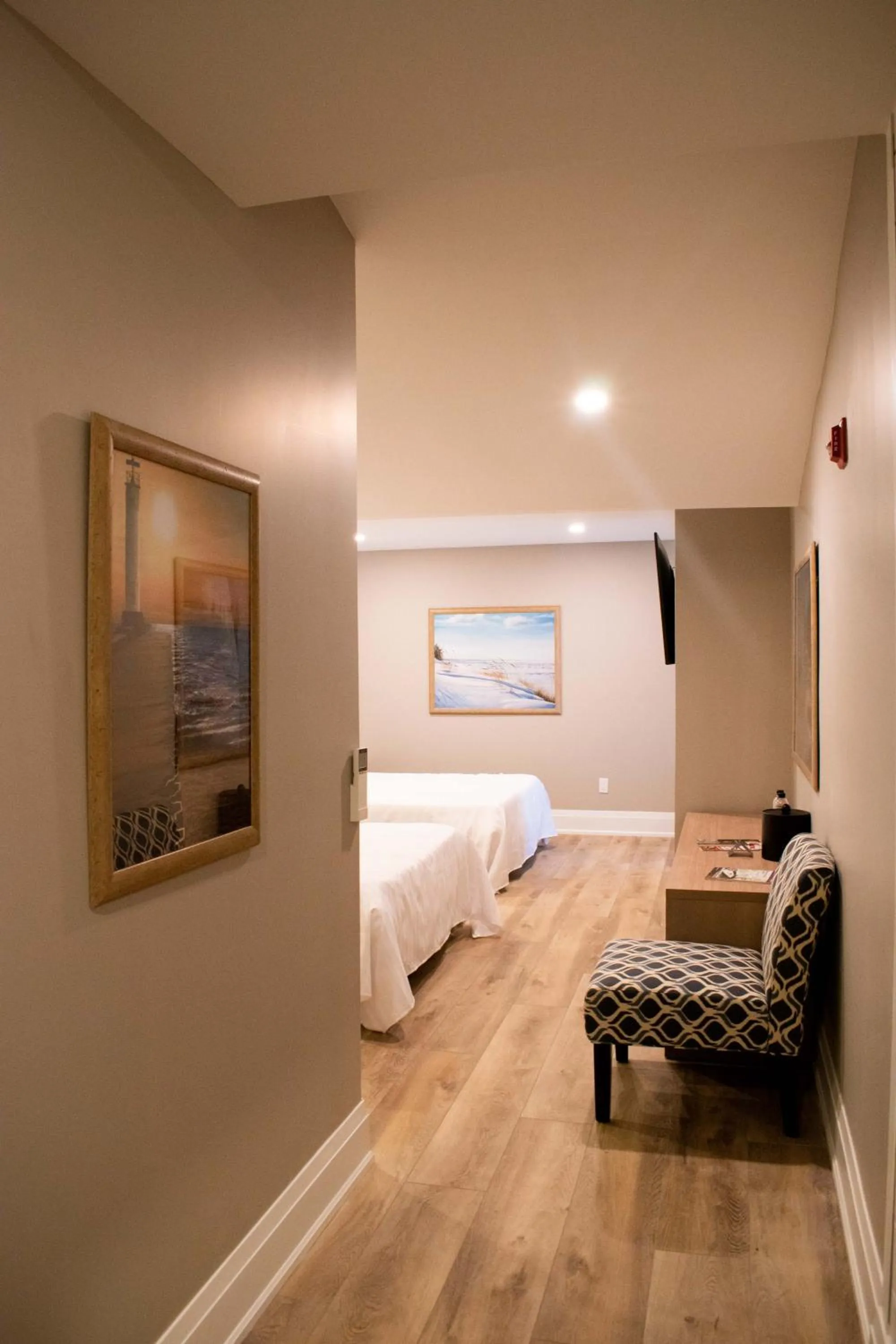 Bed in Colonial Hotel & Suites