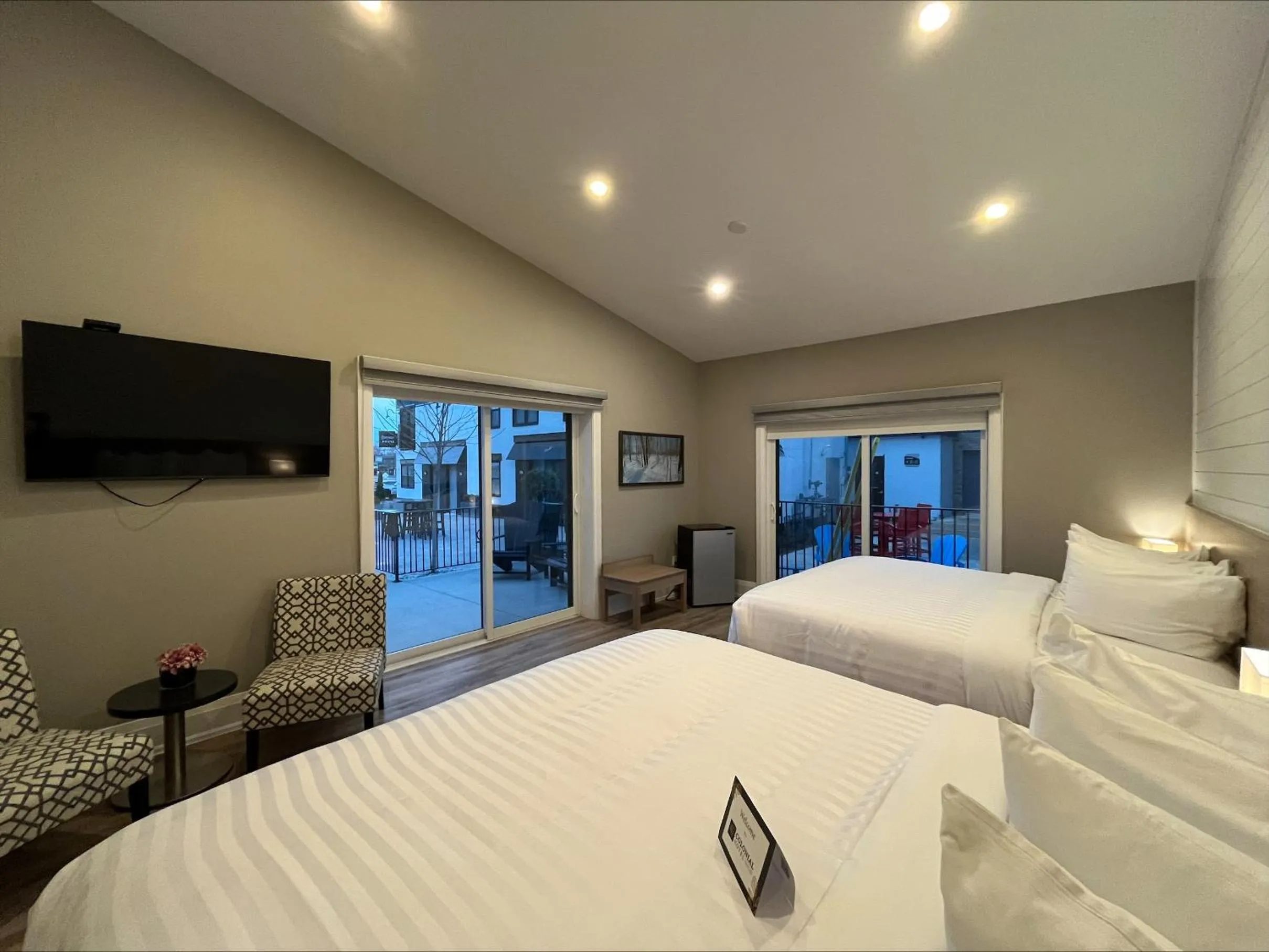 Bed in Colonial Hotel & Suites