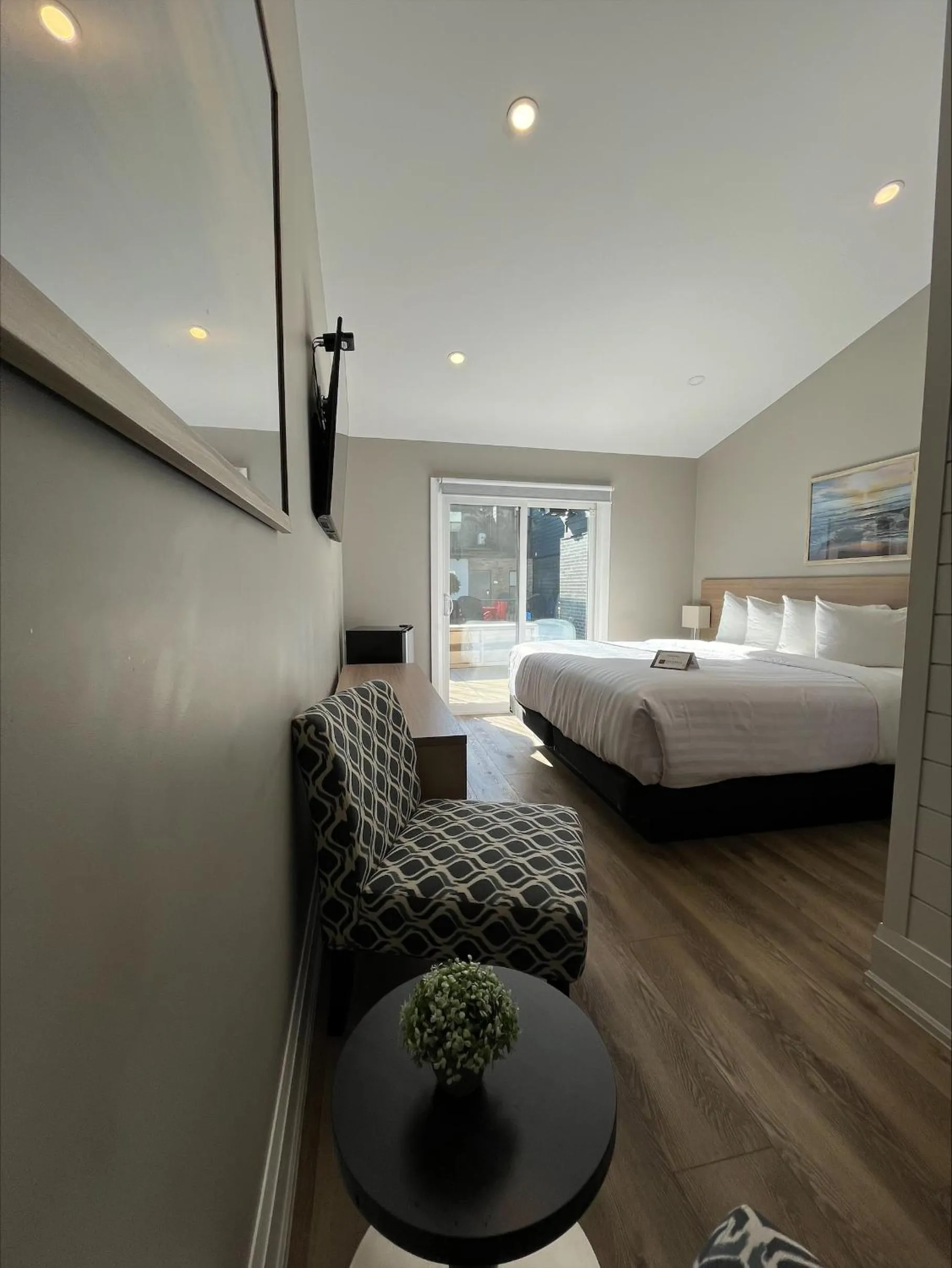 Bed in Colonial Hotel & Suites