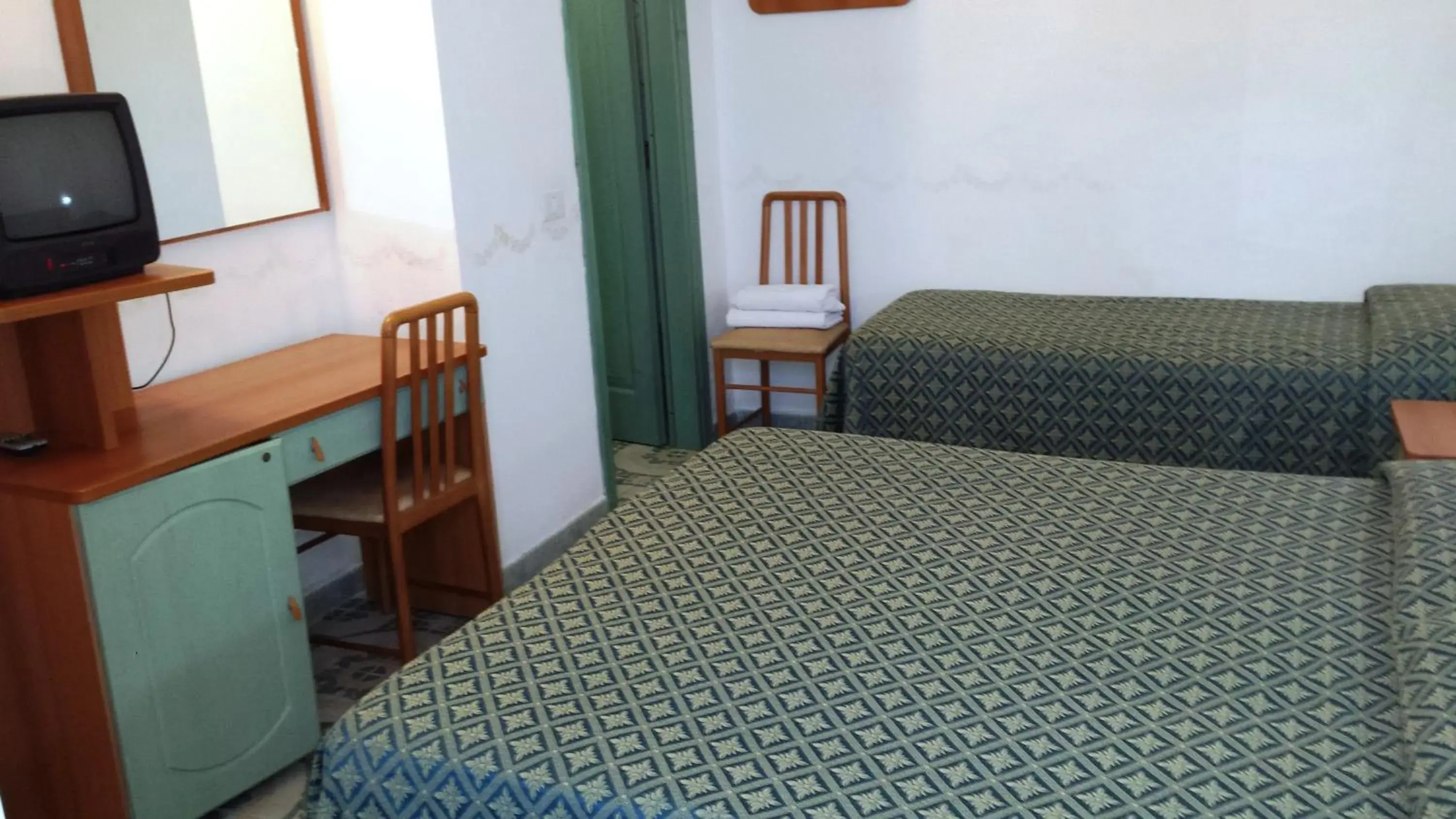 Triple Room in Hotel Castiglione Triple Room in Hotel Castiglione