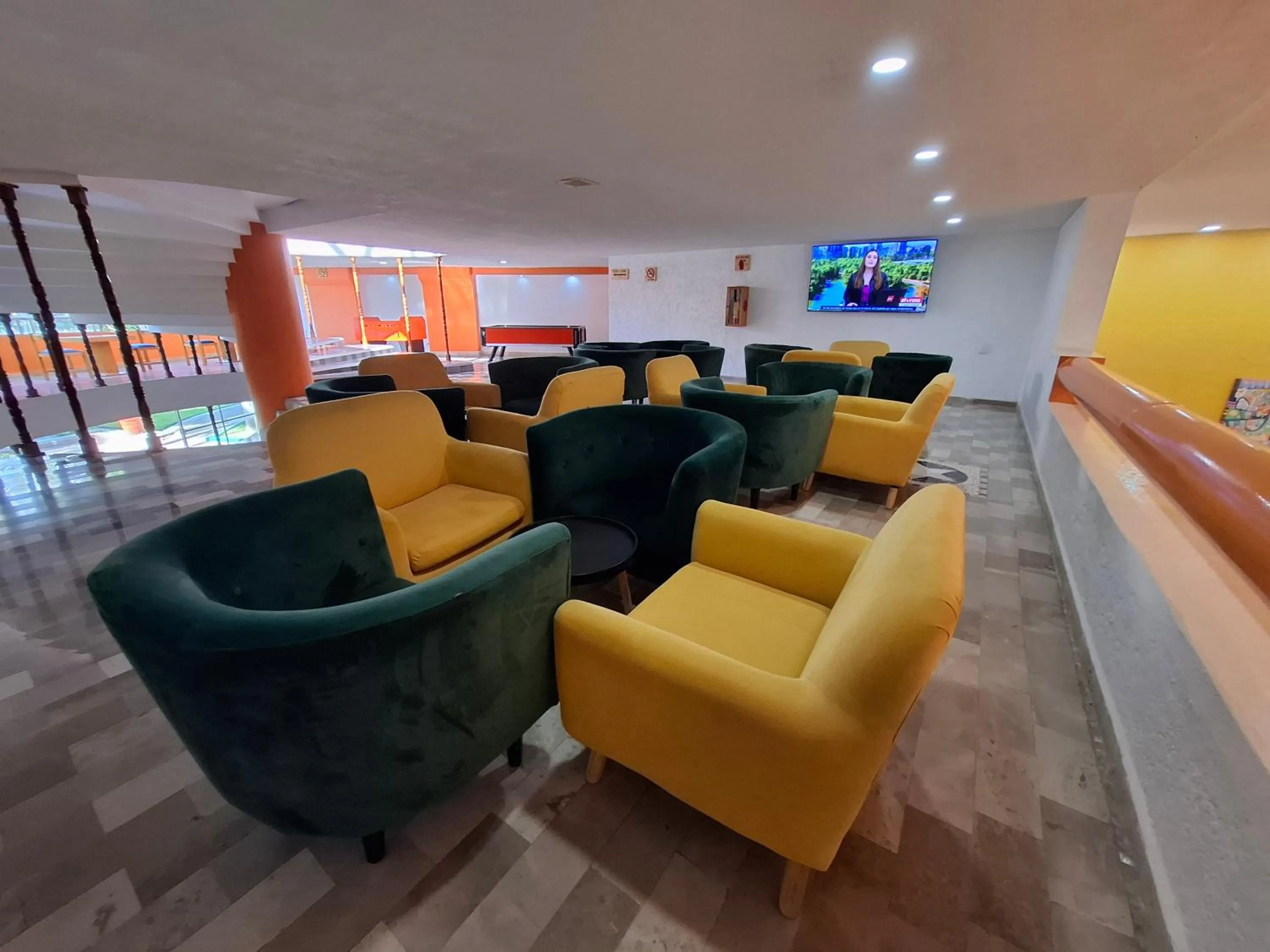 Communal lounge/ TV room in Hotel Aristos Cuernavaca