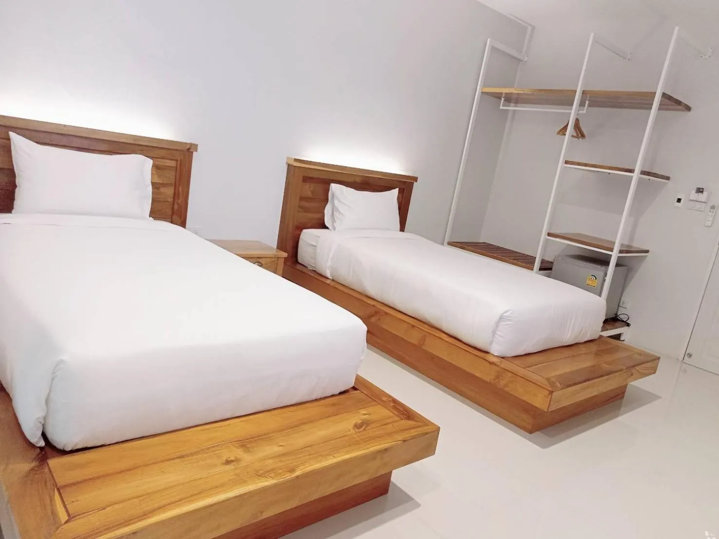 Photo of the whole room, Bed in Greenish Ranong Hotel