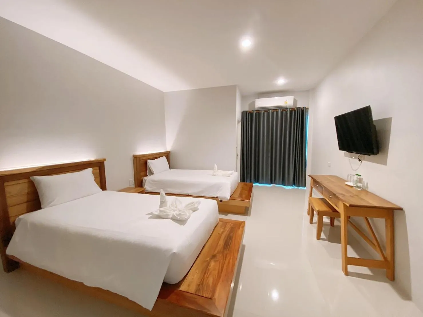 Photo of the whole room, Bed in Greenish Ranong Hotel