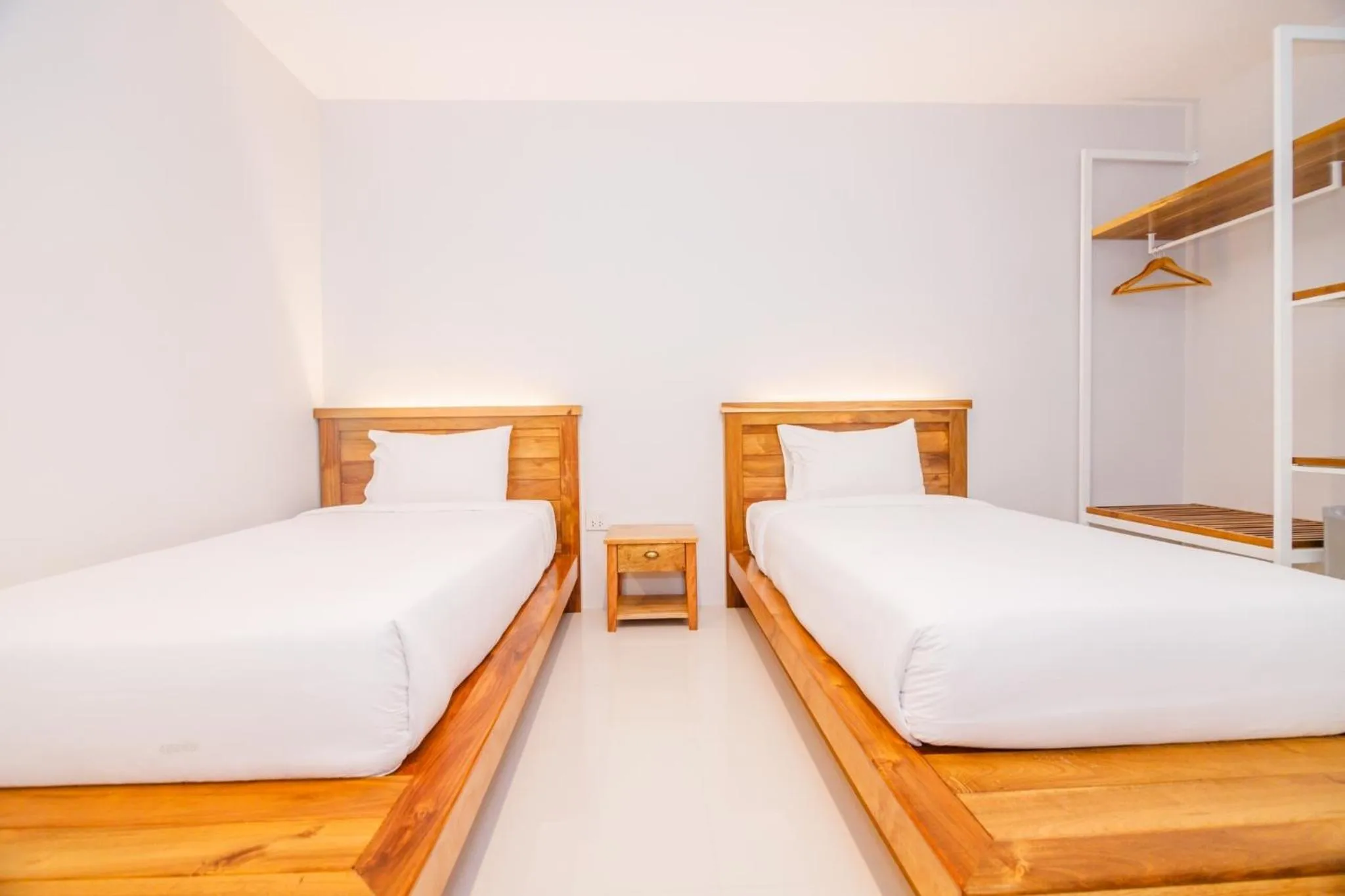 Photo of the whole room, Bed in Greenish Ranong Hotel