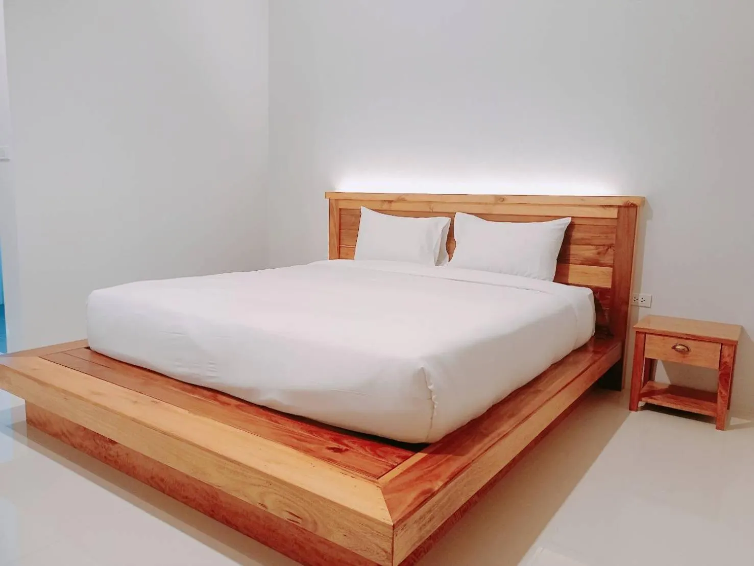 Photo of the whole room, Bed in Greenish Ranong Hotel