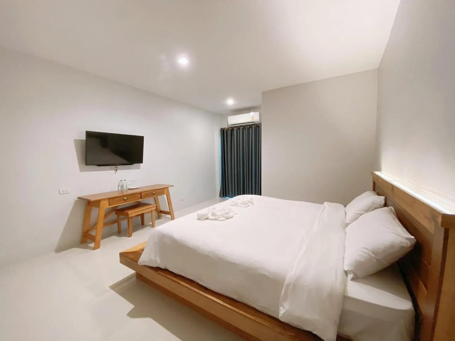 Photo of the whole room, Bed in Greenish Ranong Hotel