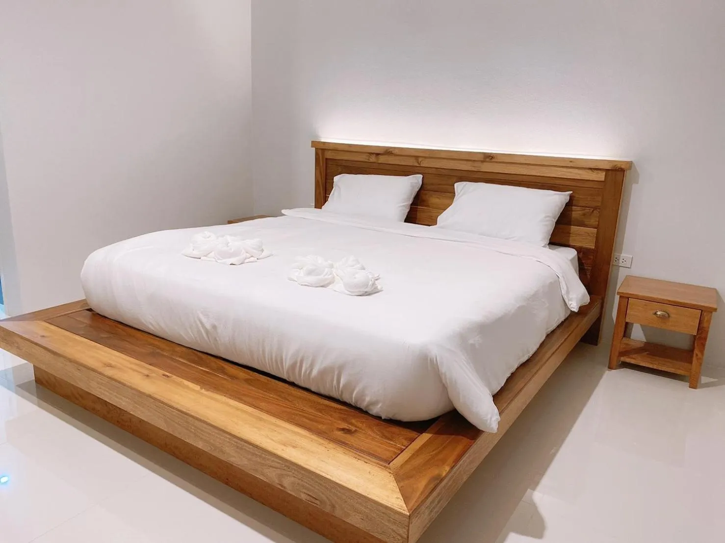 Bed in Greenish Ranong Hotel