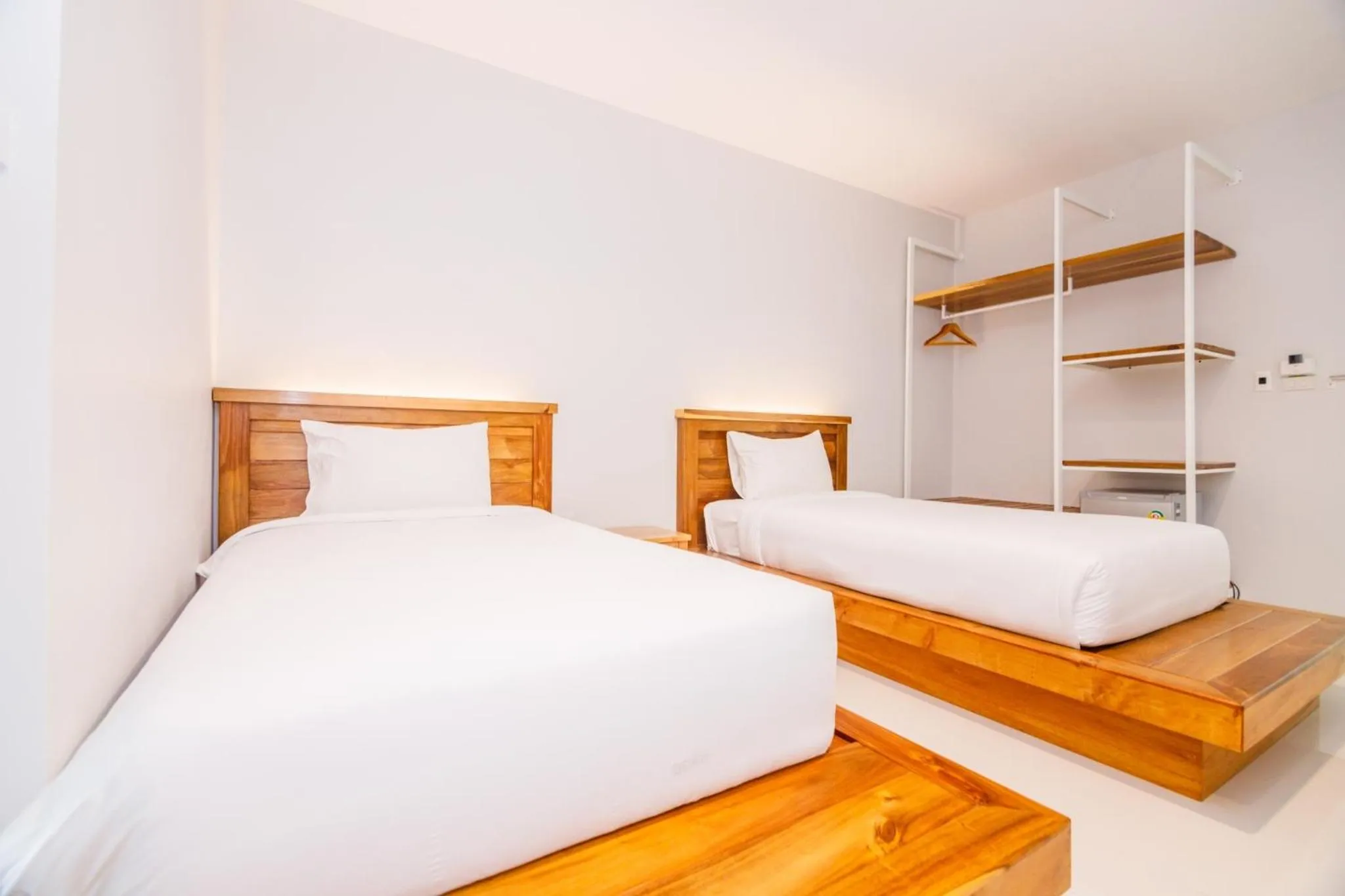 Photo of the whole room, Bed in Greenish Ranong Hotel