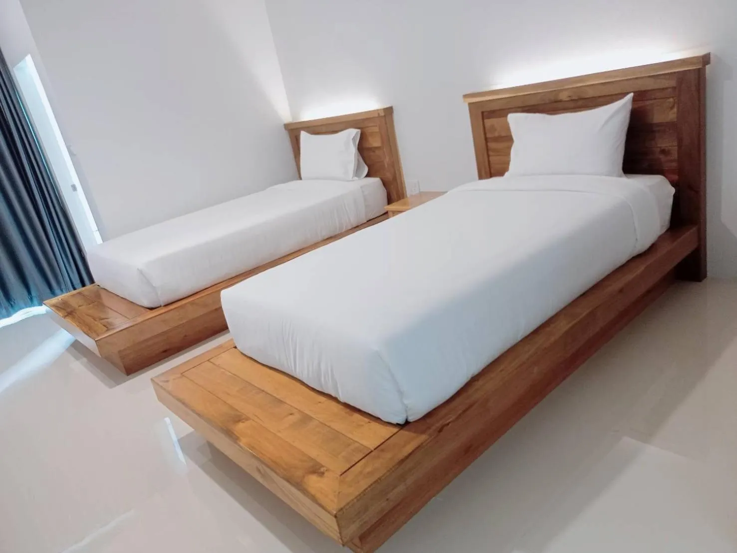 Photo of the whole room, Bed in Greenish Ranong Hotel