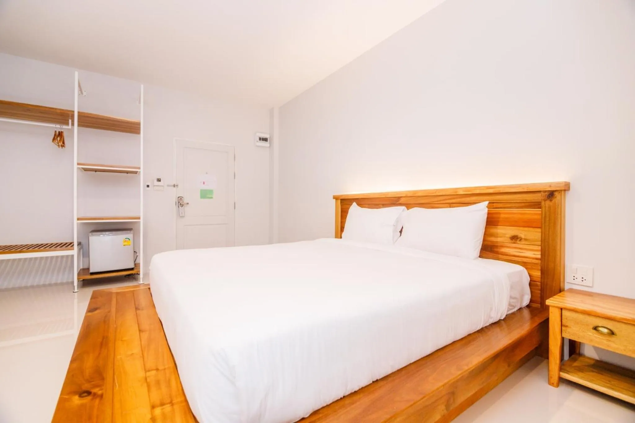 Photo of the whole room, Bed in Greenish Ranong Hotel