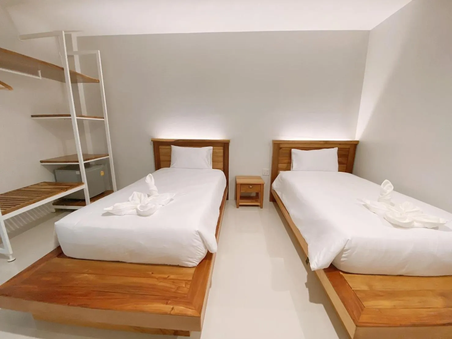 Bed in Greenish Ranong Hotel