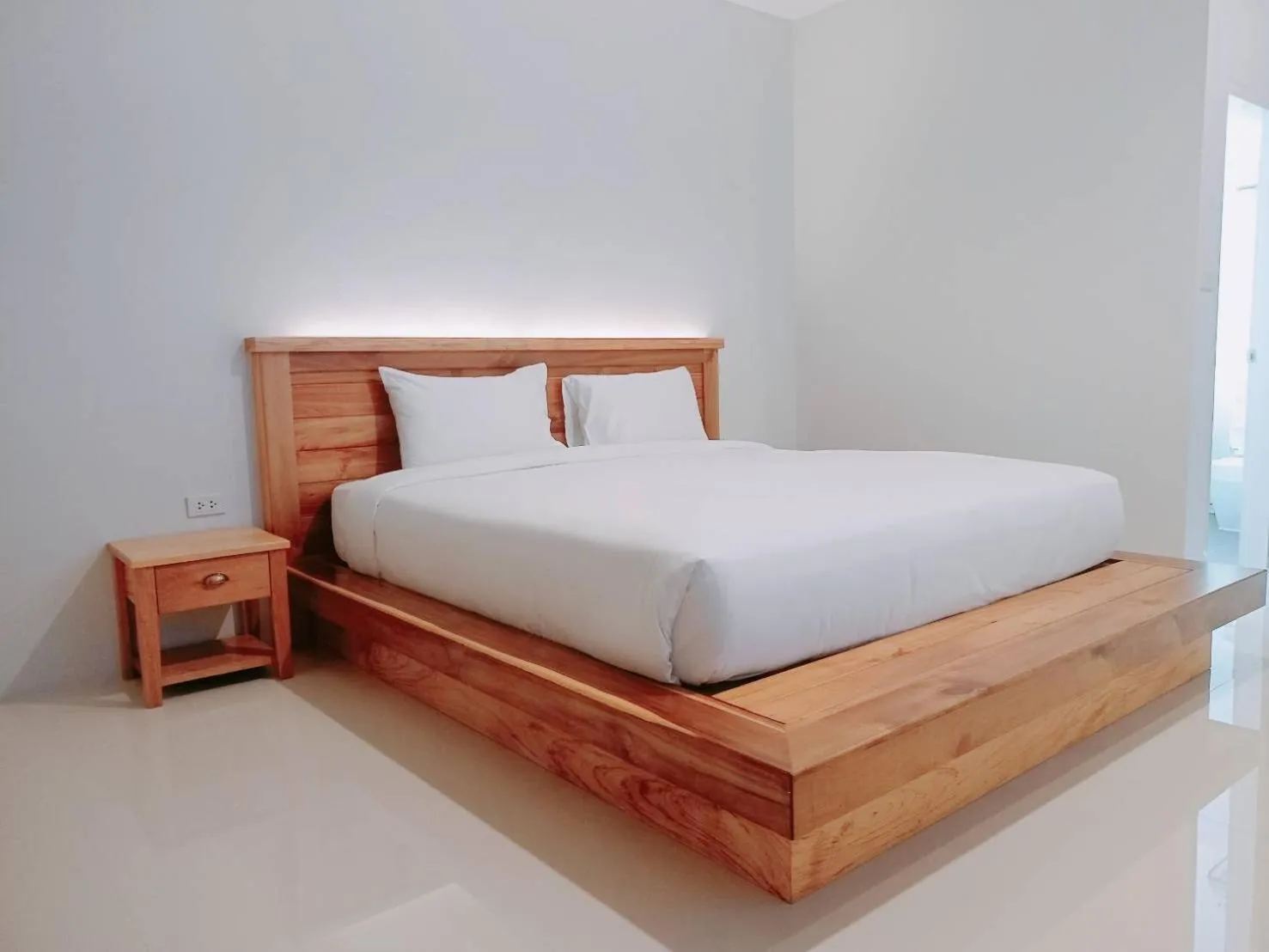 Bed in Greenish Ranong Hotel