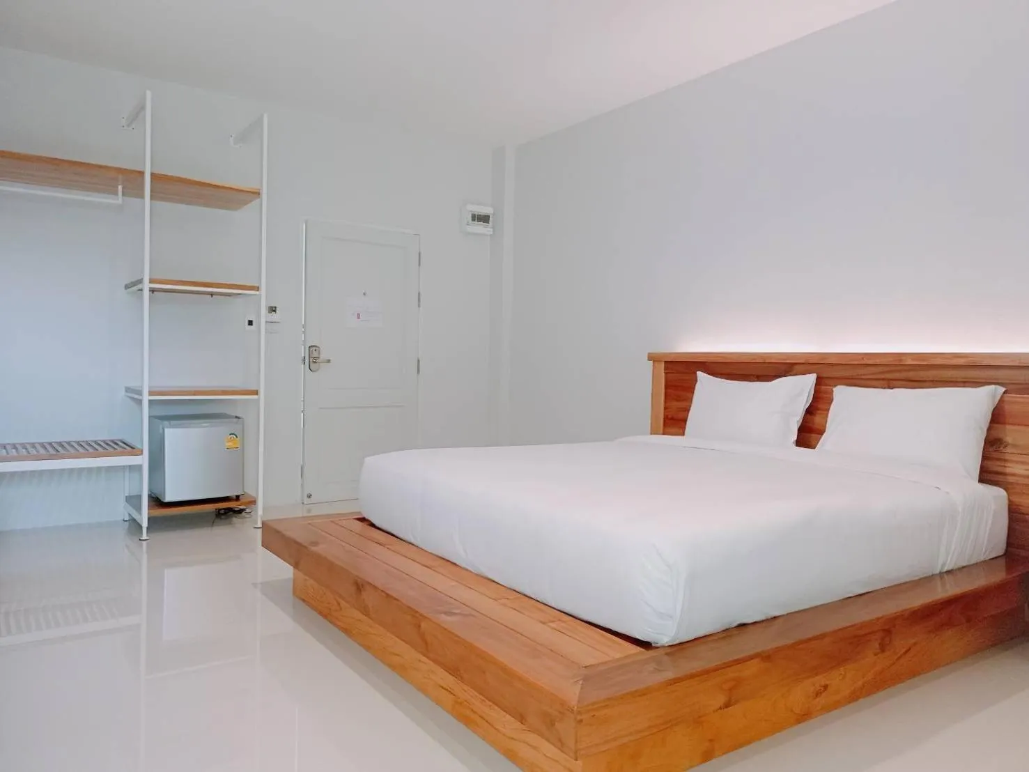 Photo of the whole room, Bed in Greenish Ranong Hotel